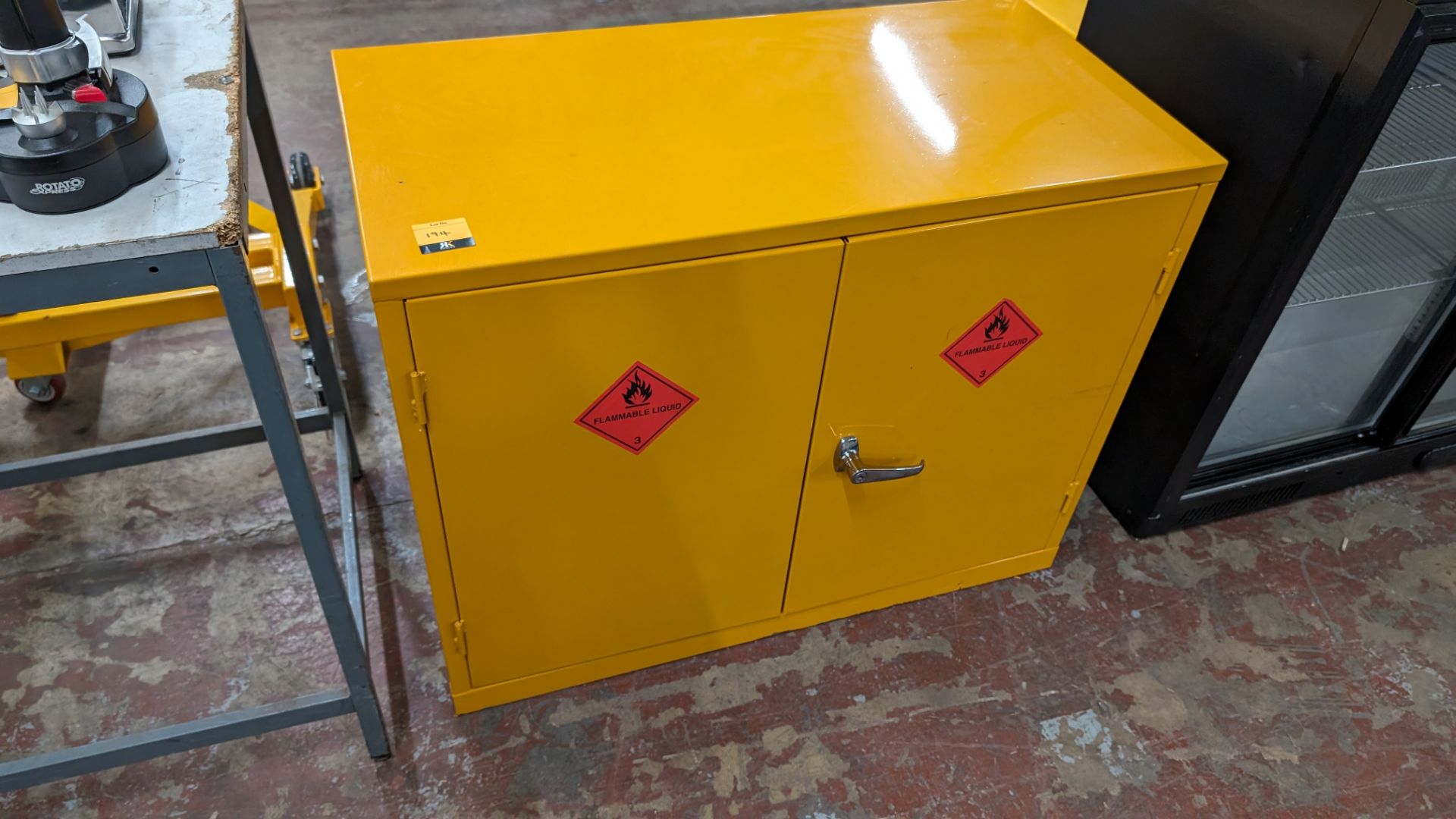 Orange metal twin door cabinet. NB: We do not have a key. However, the unit is currently unlocked - Image 3 of 4