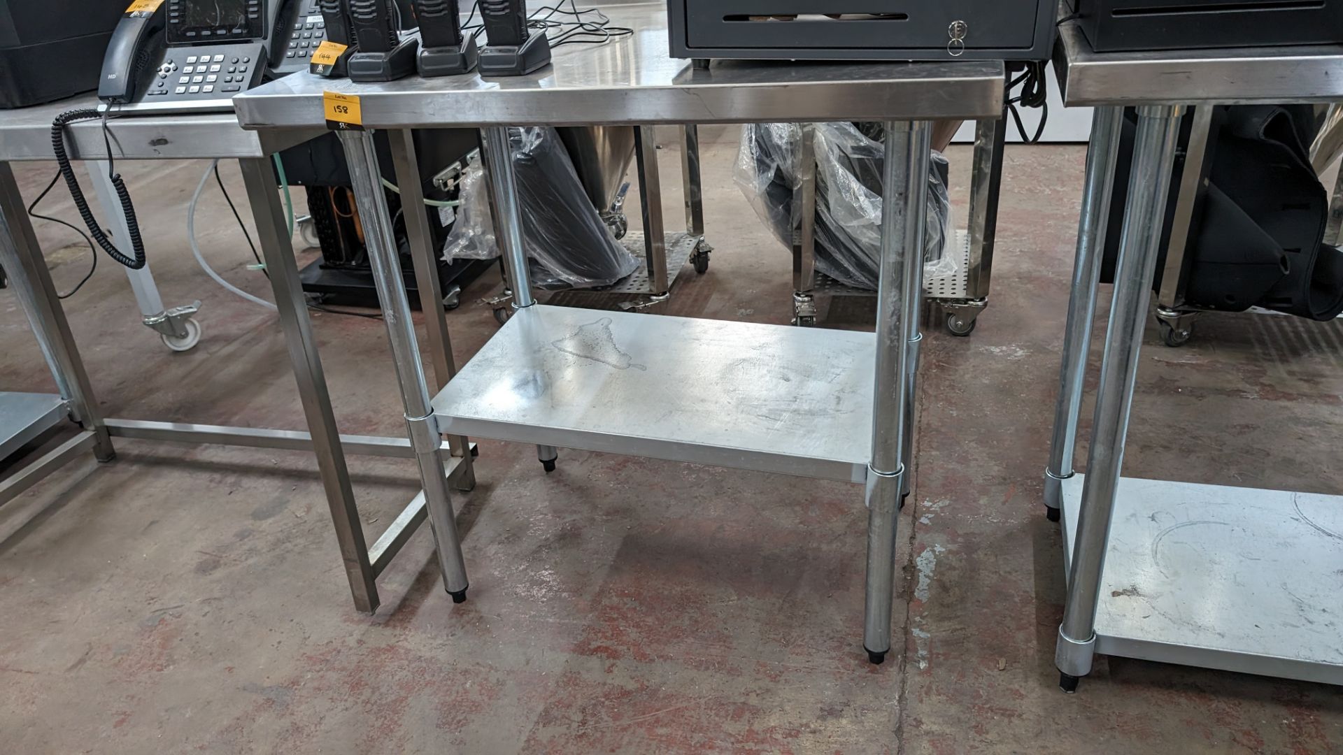 Stainless steel twin tier table with upstand at rear, max dimensions: 940mm x 610mm x 915mm - Image 2 of 3