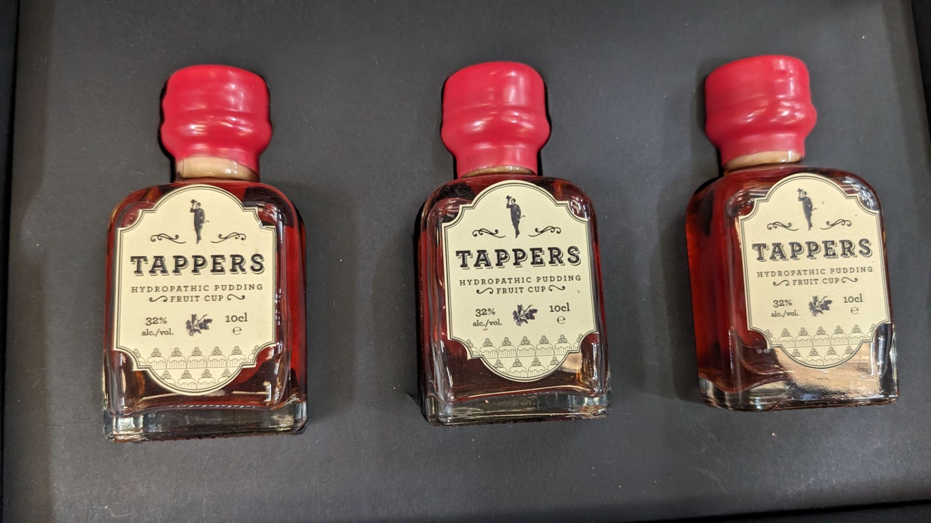 3 off 100ml bottles of Tappers Hydropathic Pudding Fruit Cup, 32% ABV, including a Tappers branded p - Image 4 of 5