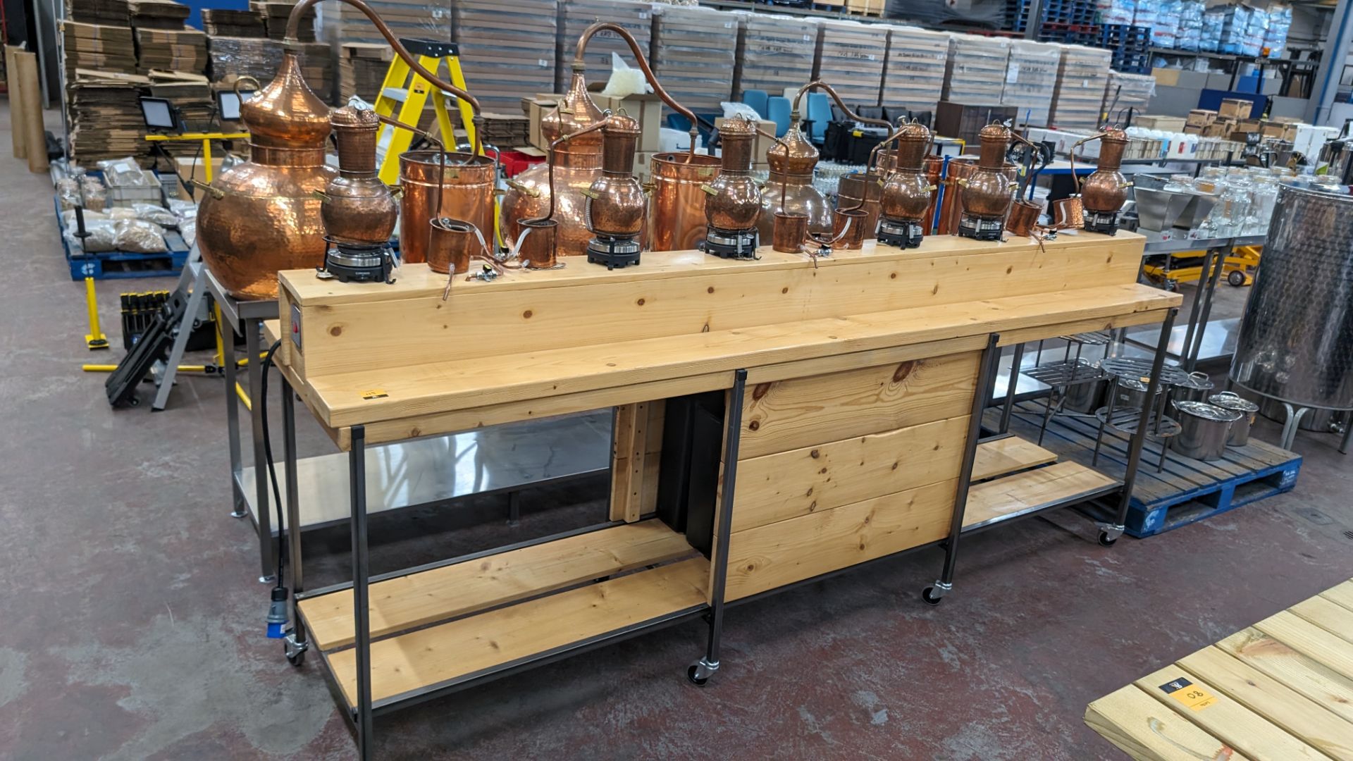 6 off small stills plus mobile bench. This lot comprises a custom made mobile bench with a metal fr - Image 4 of 18