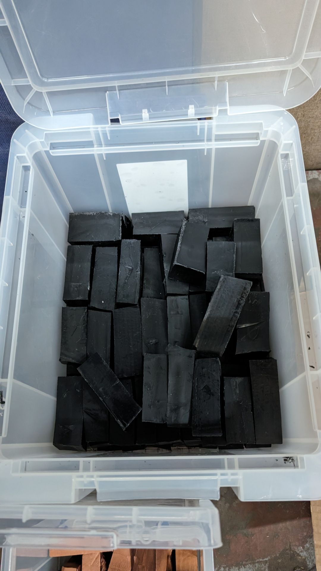 The contents of 2 crates of blocks of wax in black and gold - Image 4 of 4