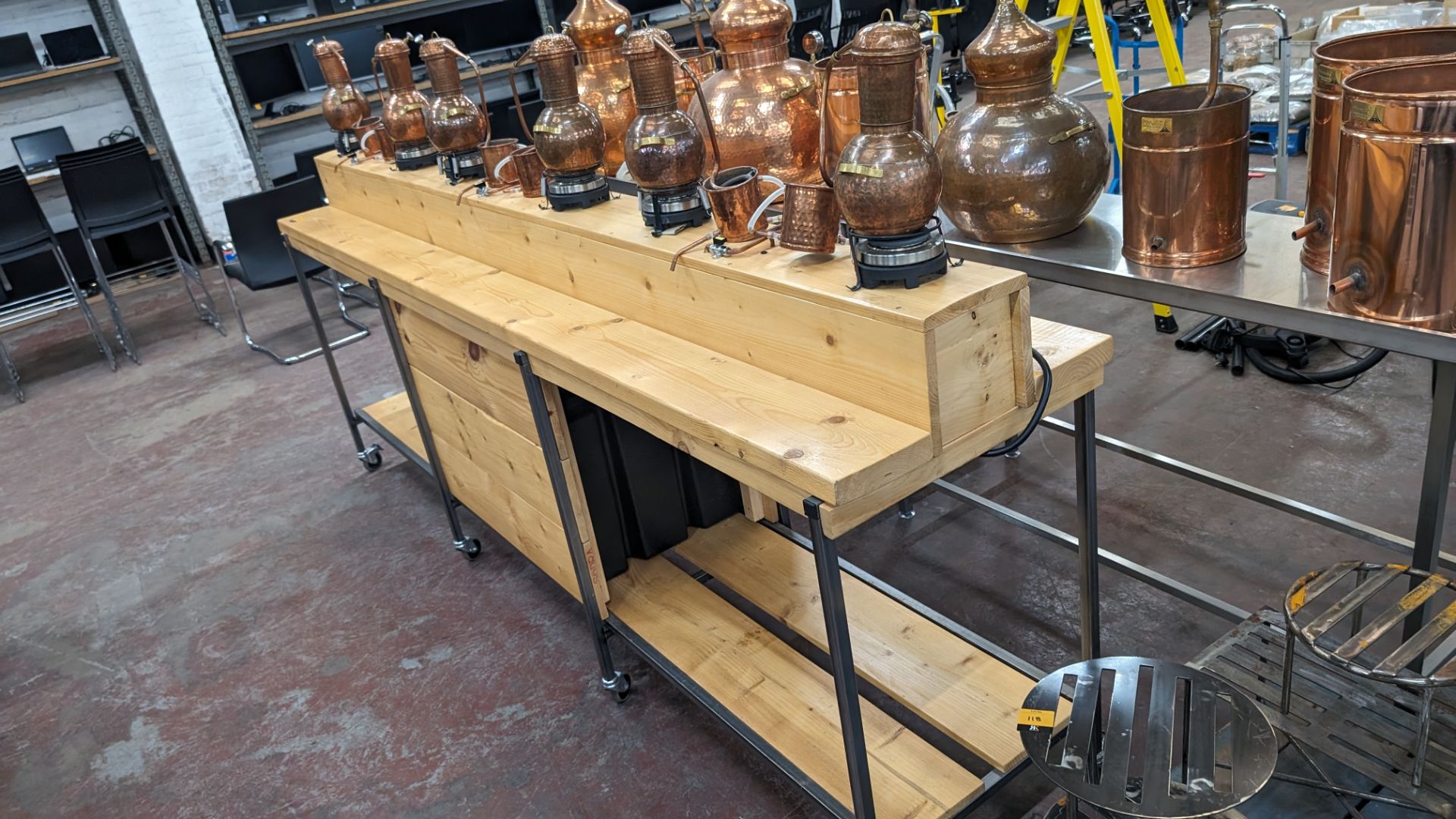 6 off small stills plus mobile bench. This lot comprises a custom made mobile bench with a metal fr - Image 2 of 18