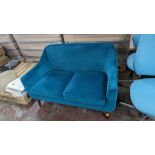 Turquoise velour 2-seat sofa on dark brown wooden legs