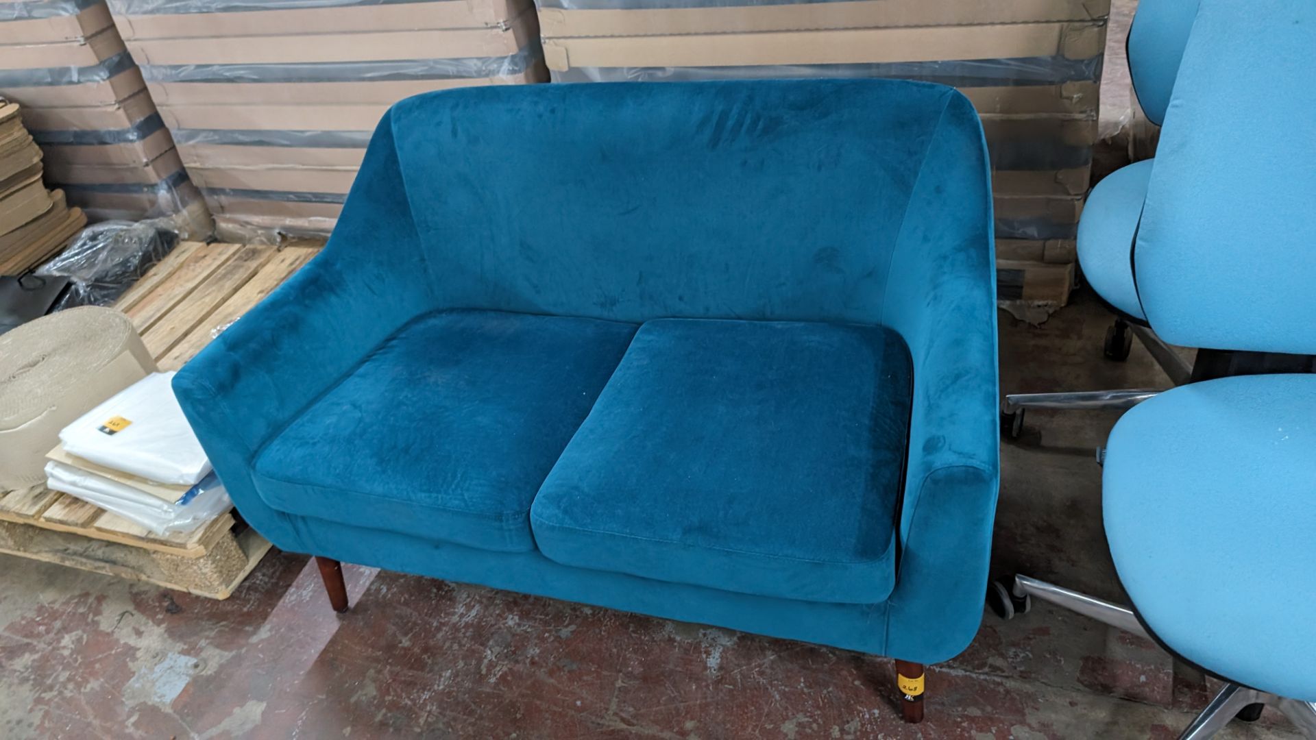 Turquoise velour 2-seat sofa on dark brown wooden legs