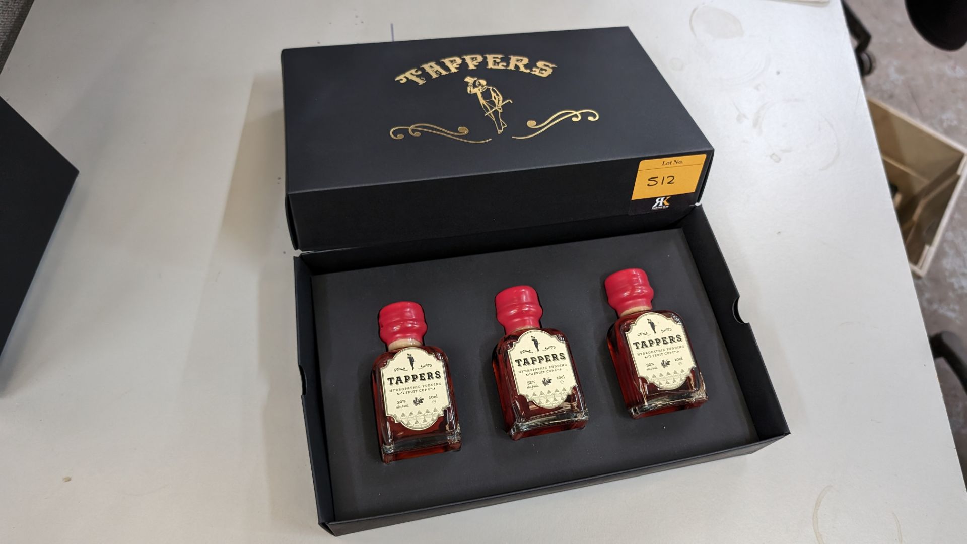3 off 100ml bottles of Tappers Hydropathic Pudding Fruit Cup, 32% ABV, including a Tappers branded p