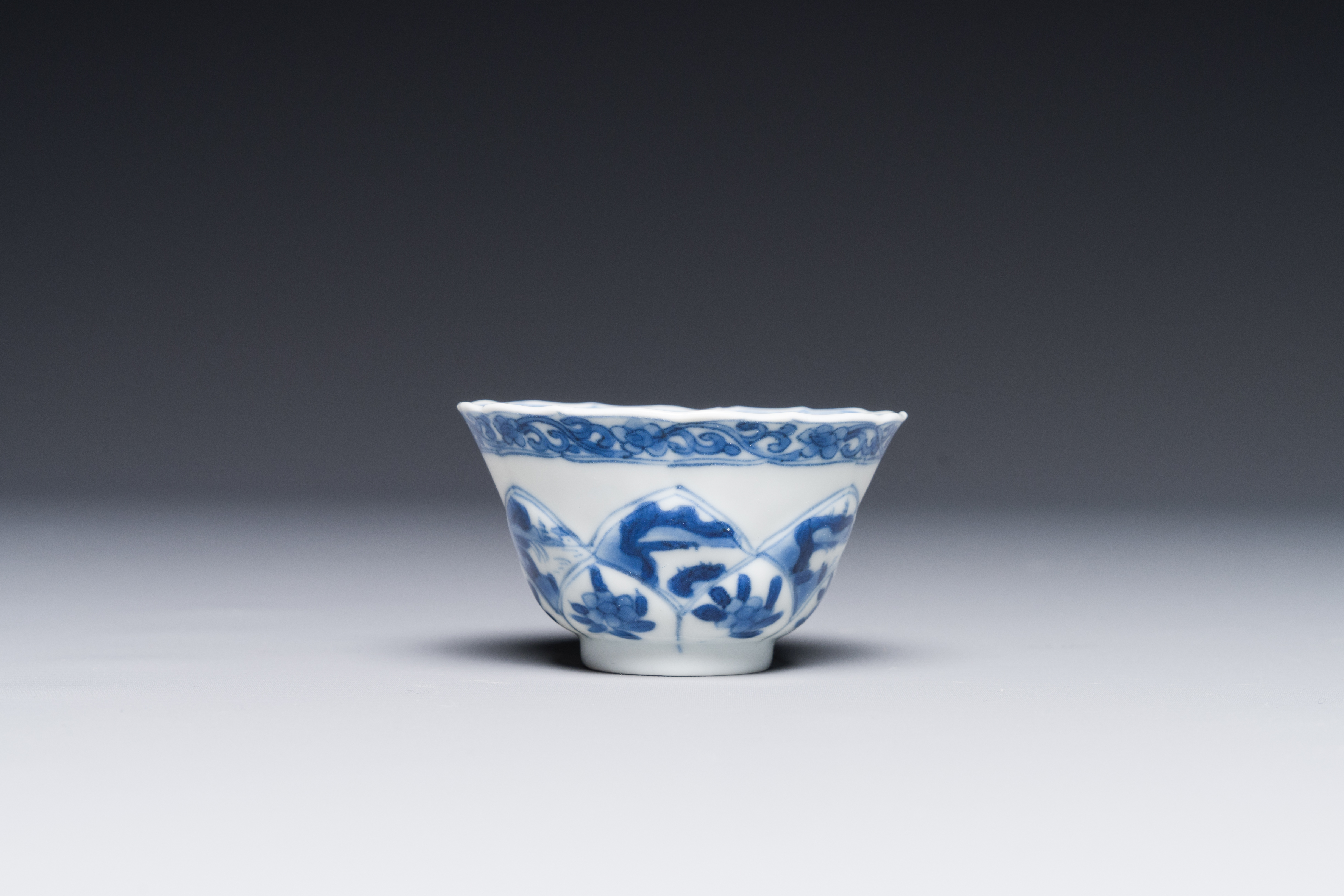 Four Chinese blue and white saucers and an 'erotic' cup, Kangxi - Image 4 of 7