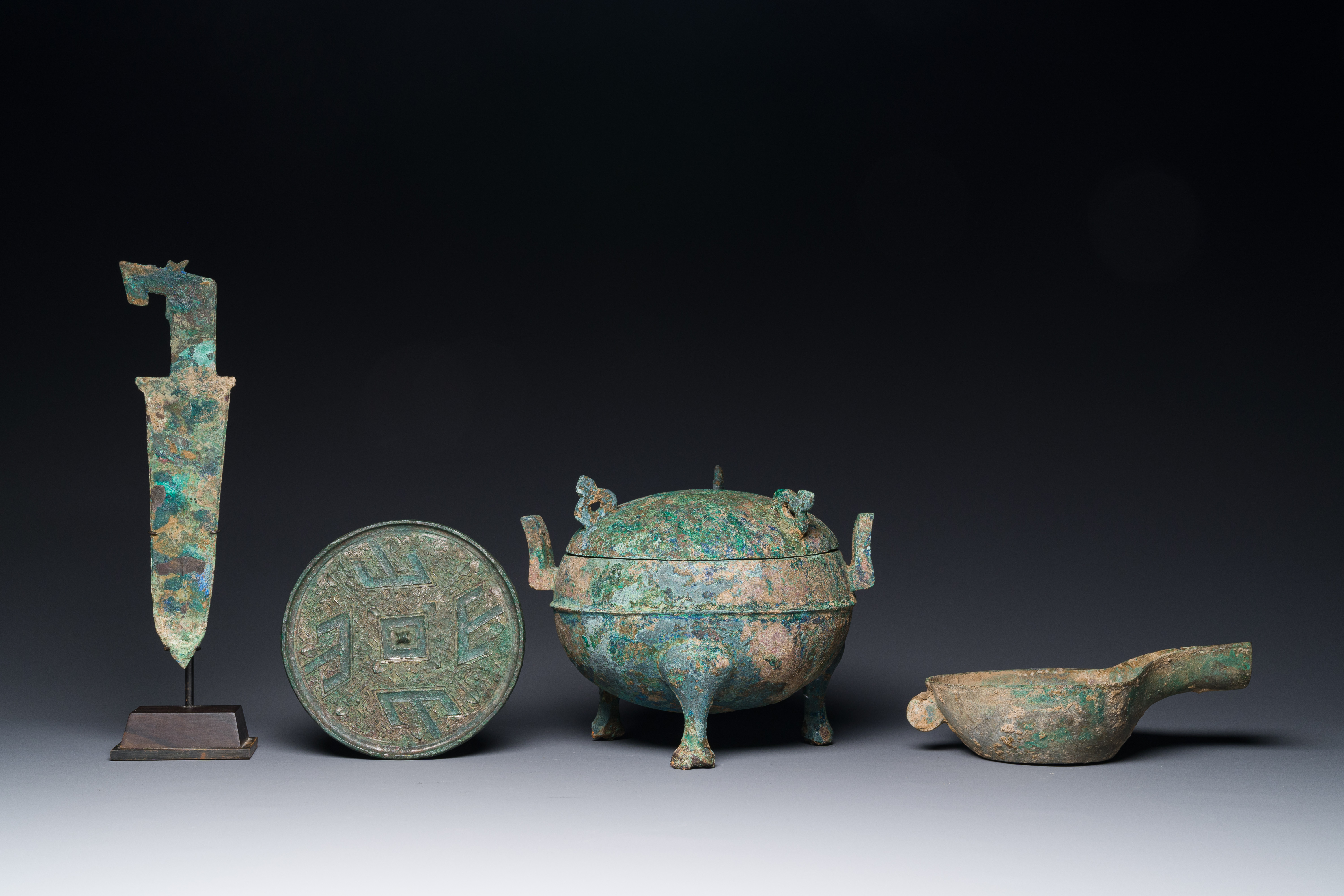 A group of four Chinese archaic bronze wares, late Shang, Warring States and Han - Image 4 of 12