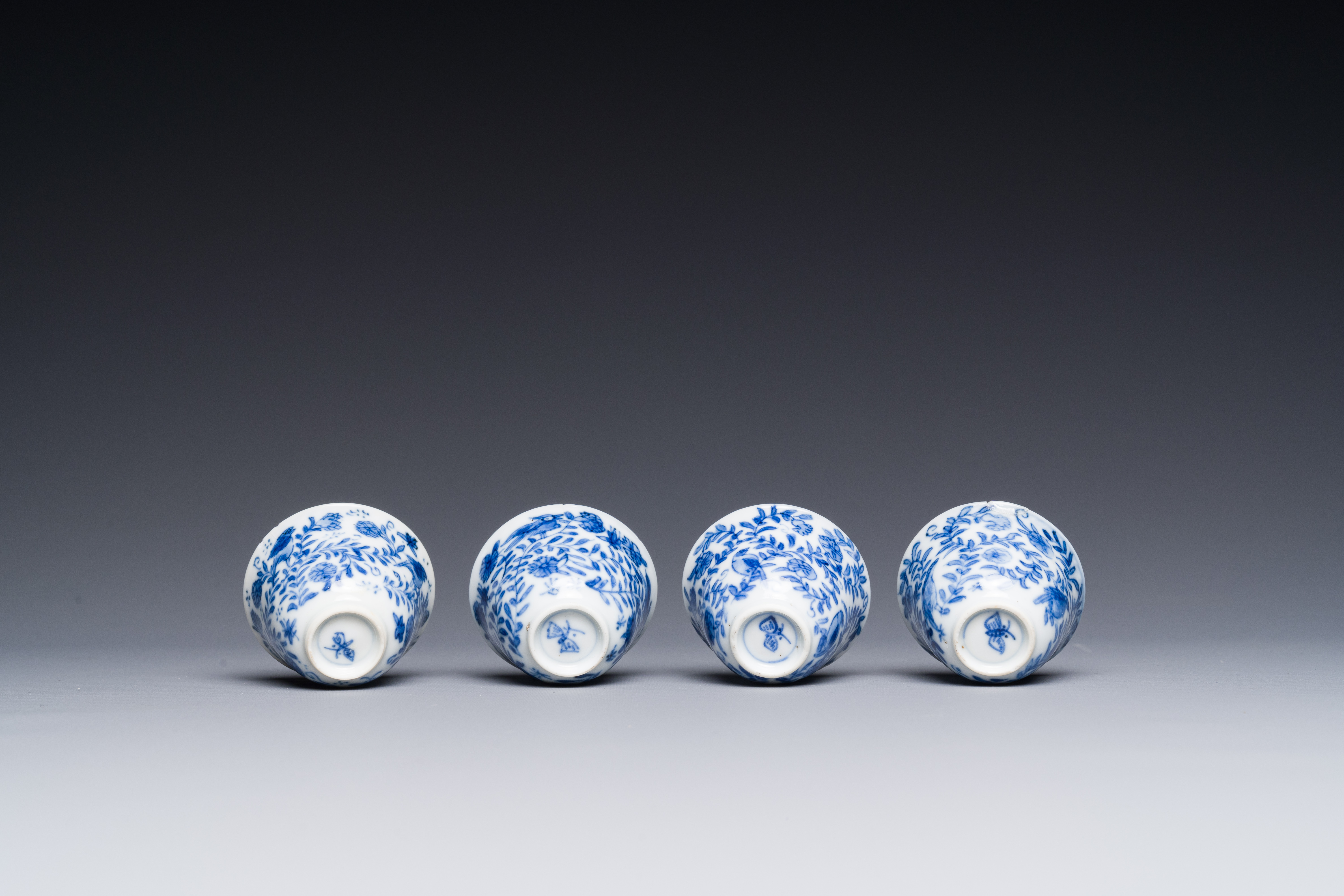 Four Chinese blue and white miniature cups and saucers, butterfly mark, Kangxi - Image 4 of 6