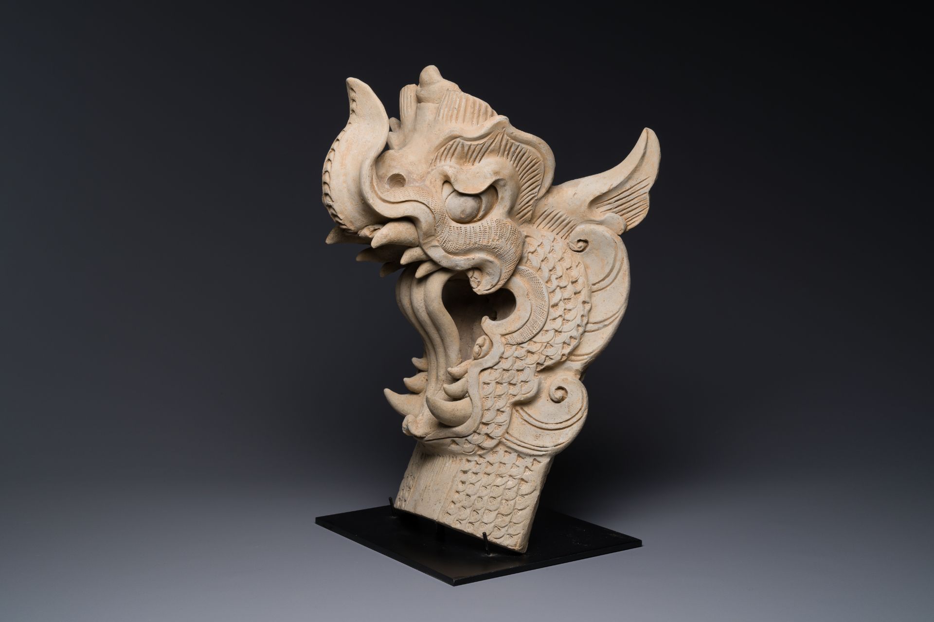A Chinese pottery dragon head architectural tile, Song/Jin - Image 4 of 27