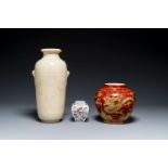 A Chinese cream-glazed vase and two 'dragon' vases, Jiajing and Wanli mark, 19/20th C.