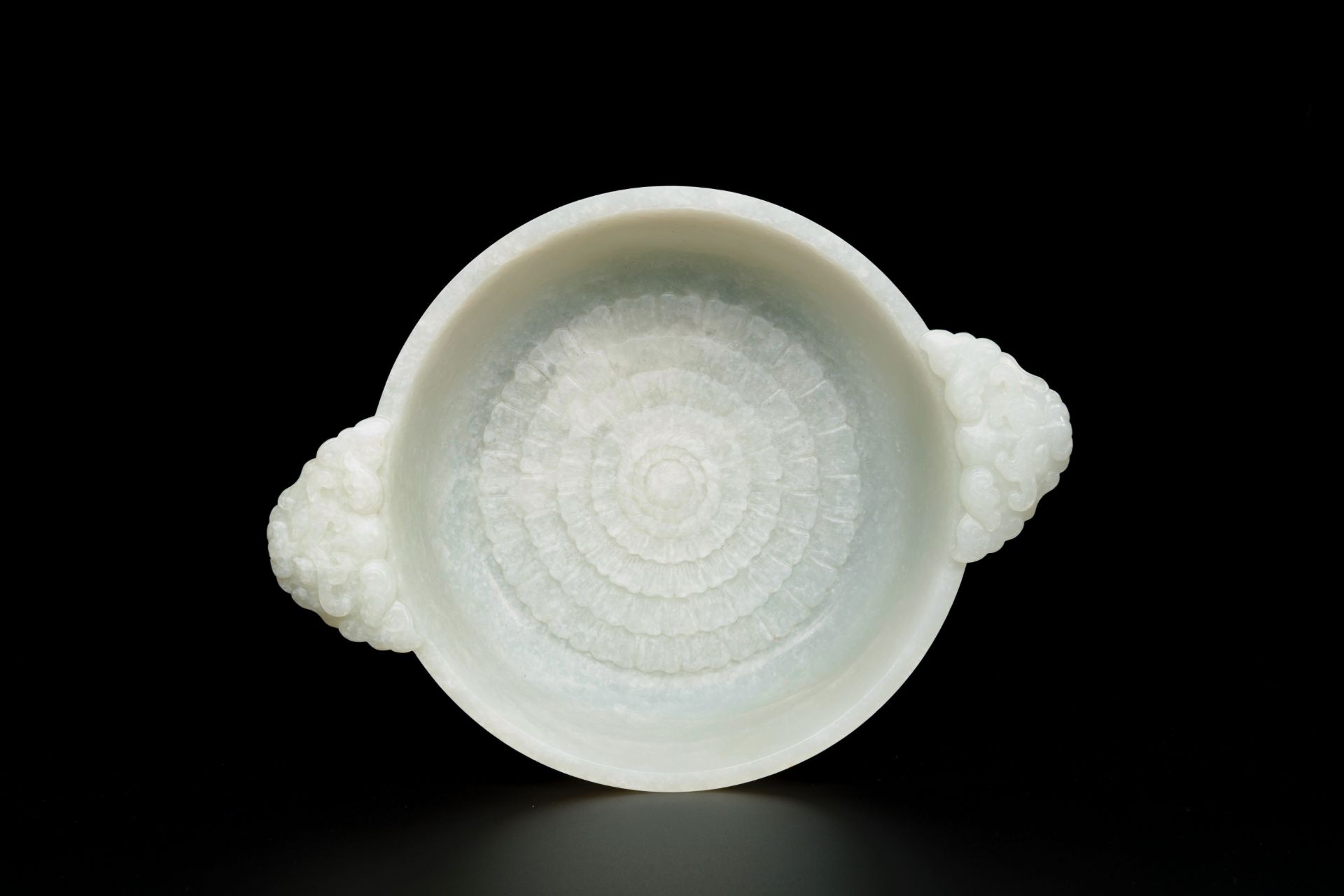 An important Chinese chrysanthemum-shaped very pale celadon jade marriage bowl, 18th C. - Image 7 of 8
