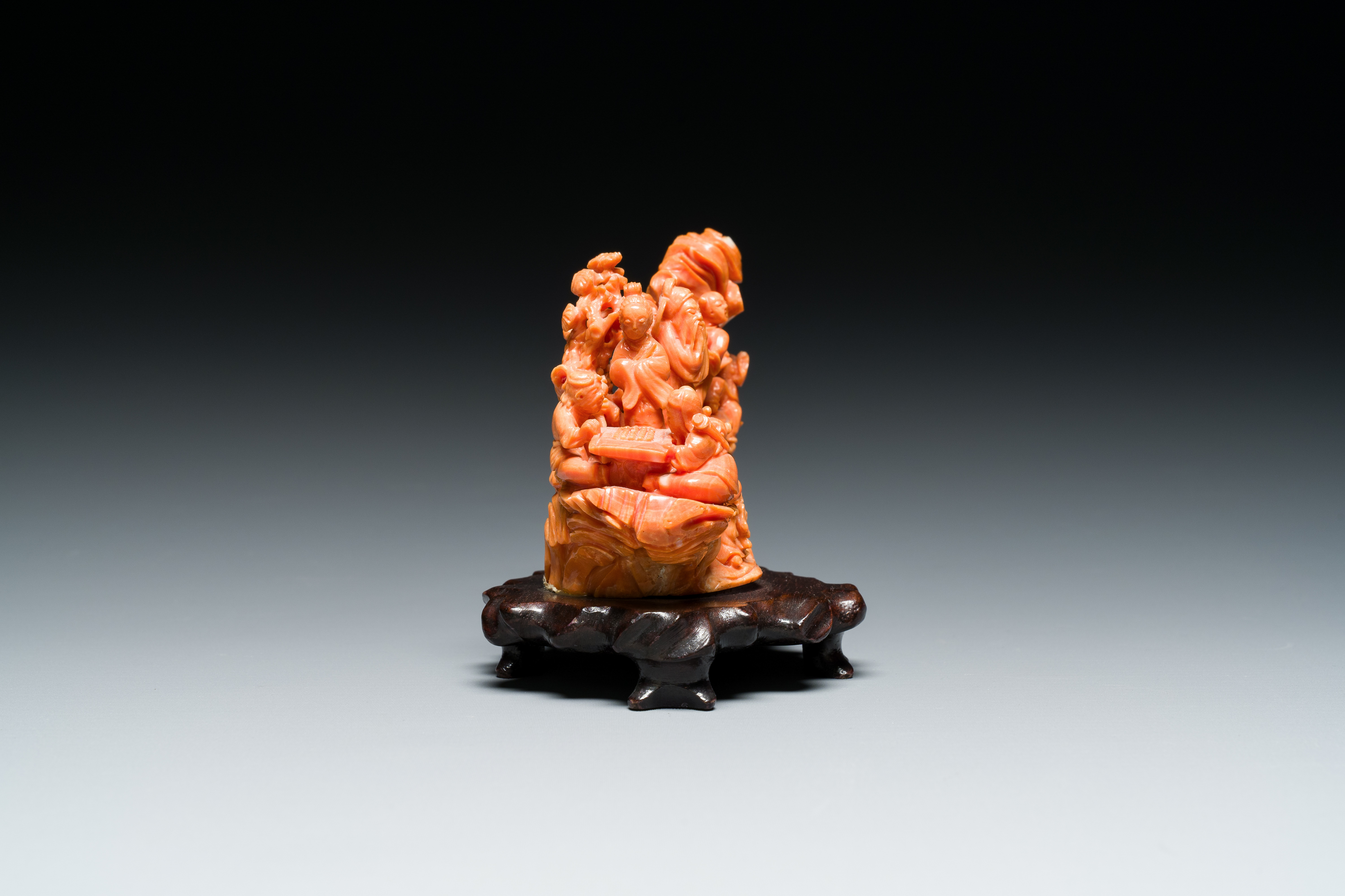 A Chinese red coral 'Eight Immortals' group on wooden stand, 19/20th C. - Image 2 of 14