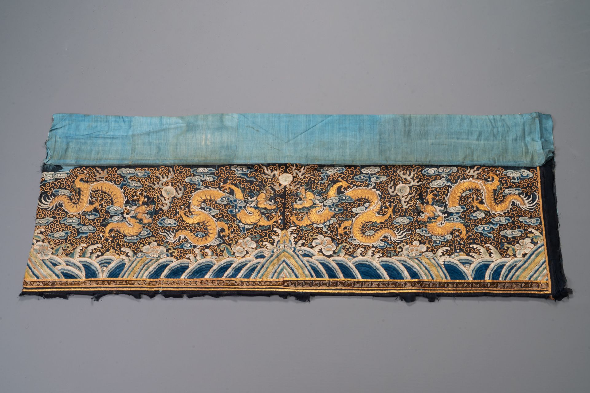 A Chinese gold- and silver-thread-embroidered silk cloth with dragons, Qing