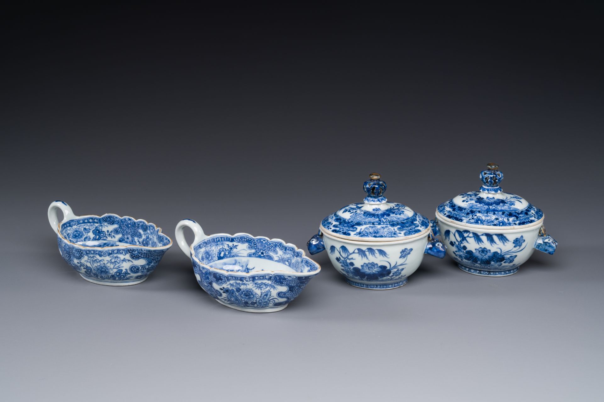 A pair Chinese blue and white sauce boats and a pair of tureens and covers, Qianlong