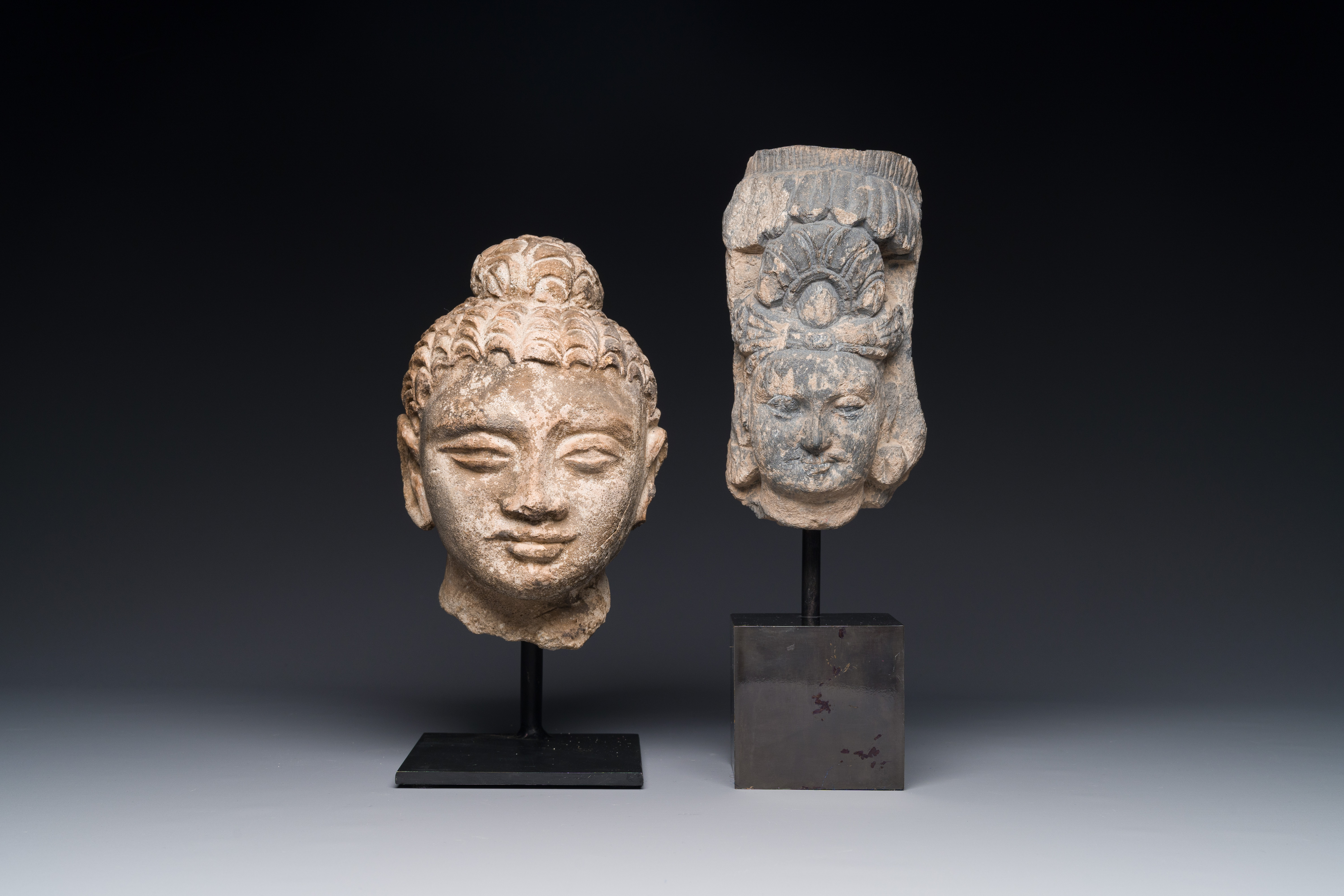 A Gandhara fragment of a stucco Sakyamuni head and a grey schist Bodhisattva head, 1/4th C. - Image 5 of 12