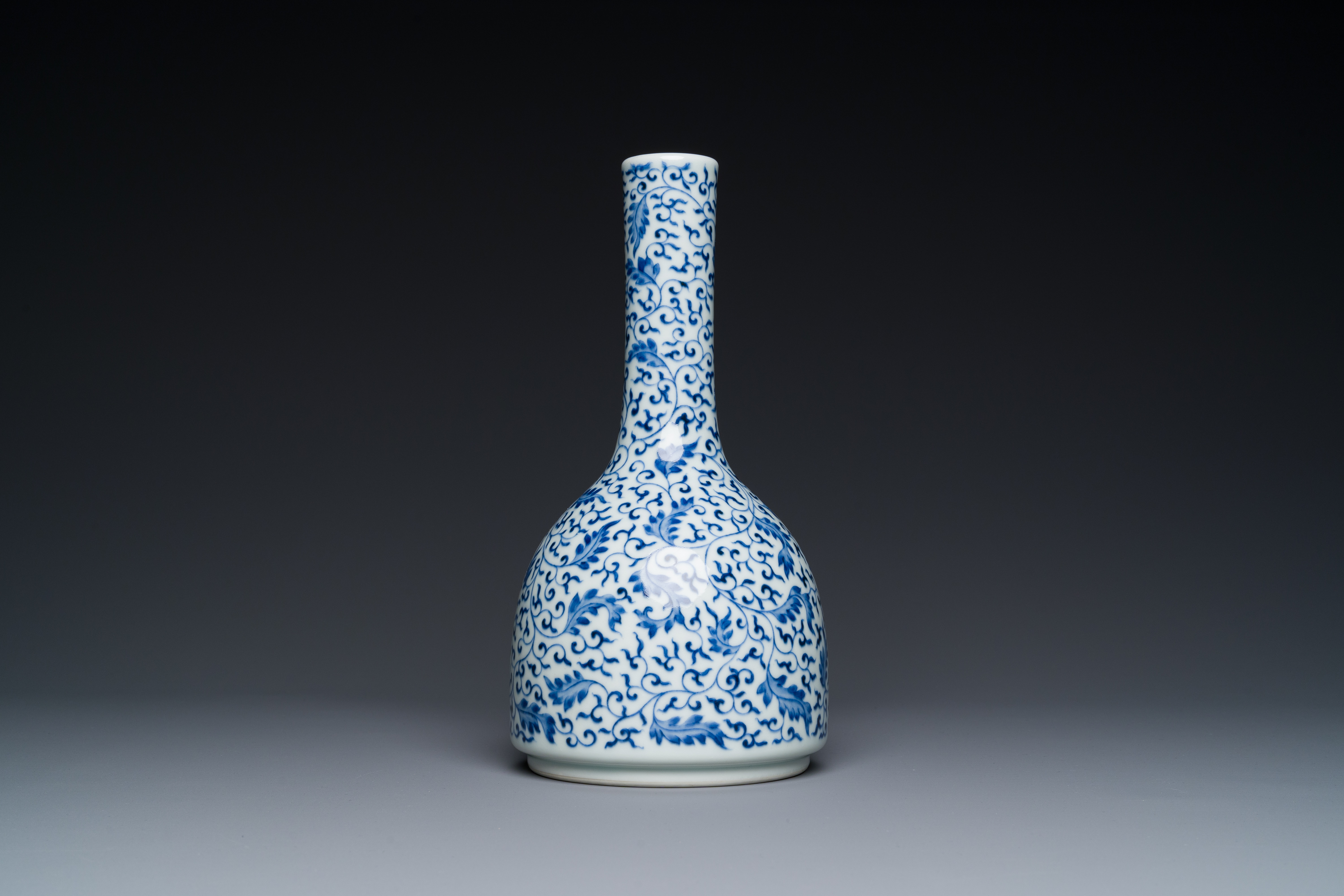 A Chinese blue and white 'lotus scroll' bottle vase, Yongzheng mark and possibly of the period - Image 4 of 6