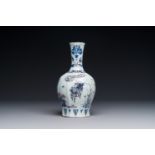 A fine Dutch Delft blue, white and manganese chinoiserie bottle vase, late 17th C.