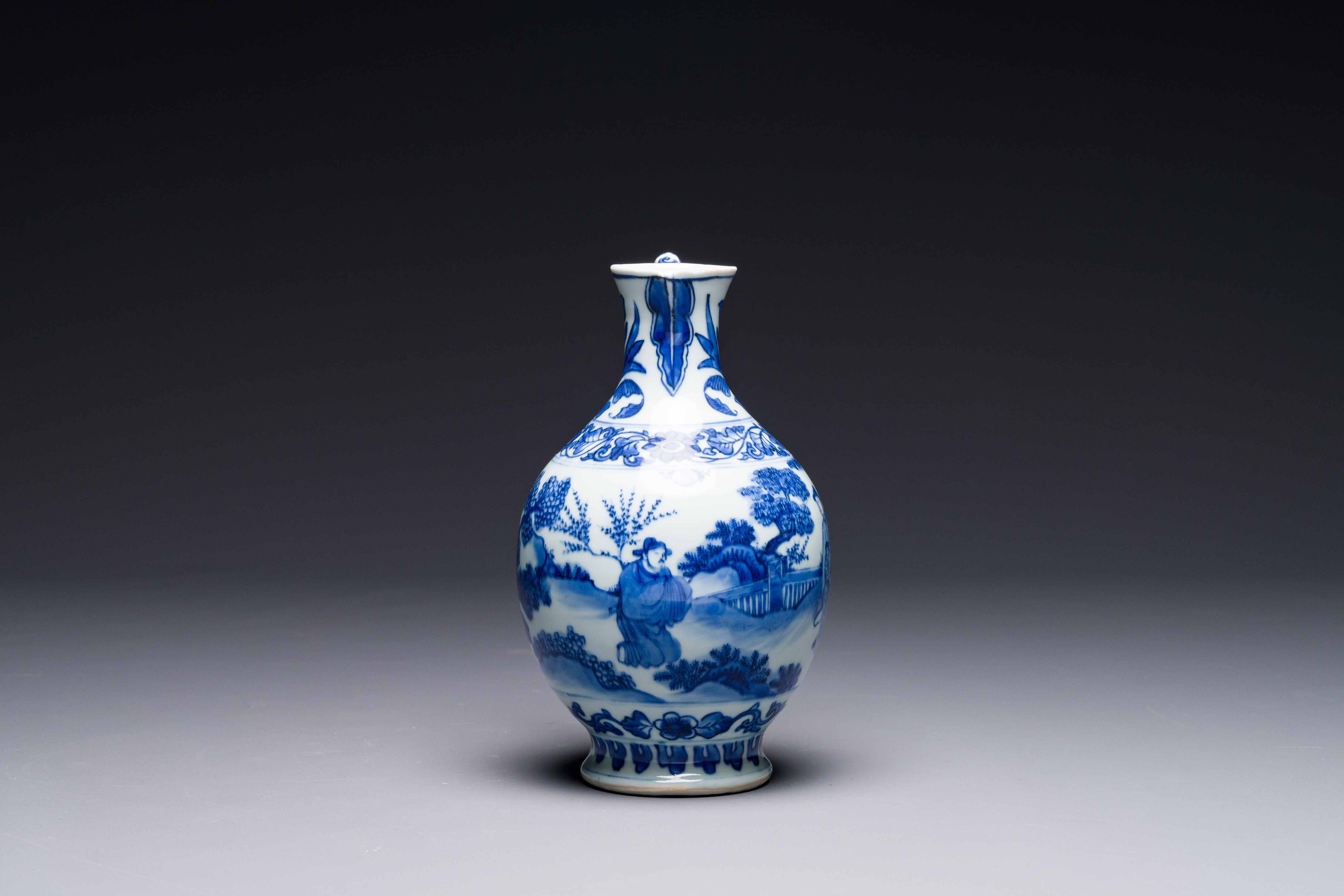 A Chinese blue and white ewer with figures in a landscape, Transitional period - Image 4 of 6