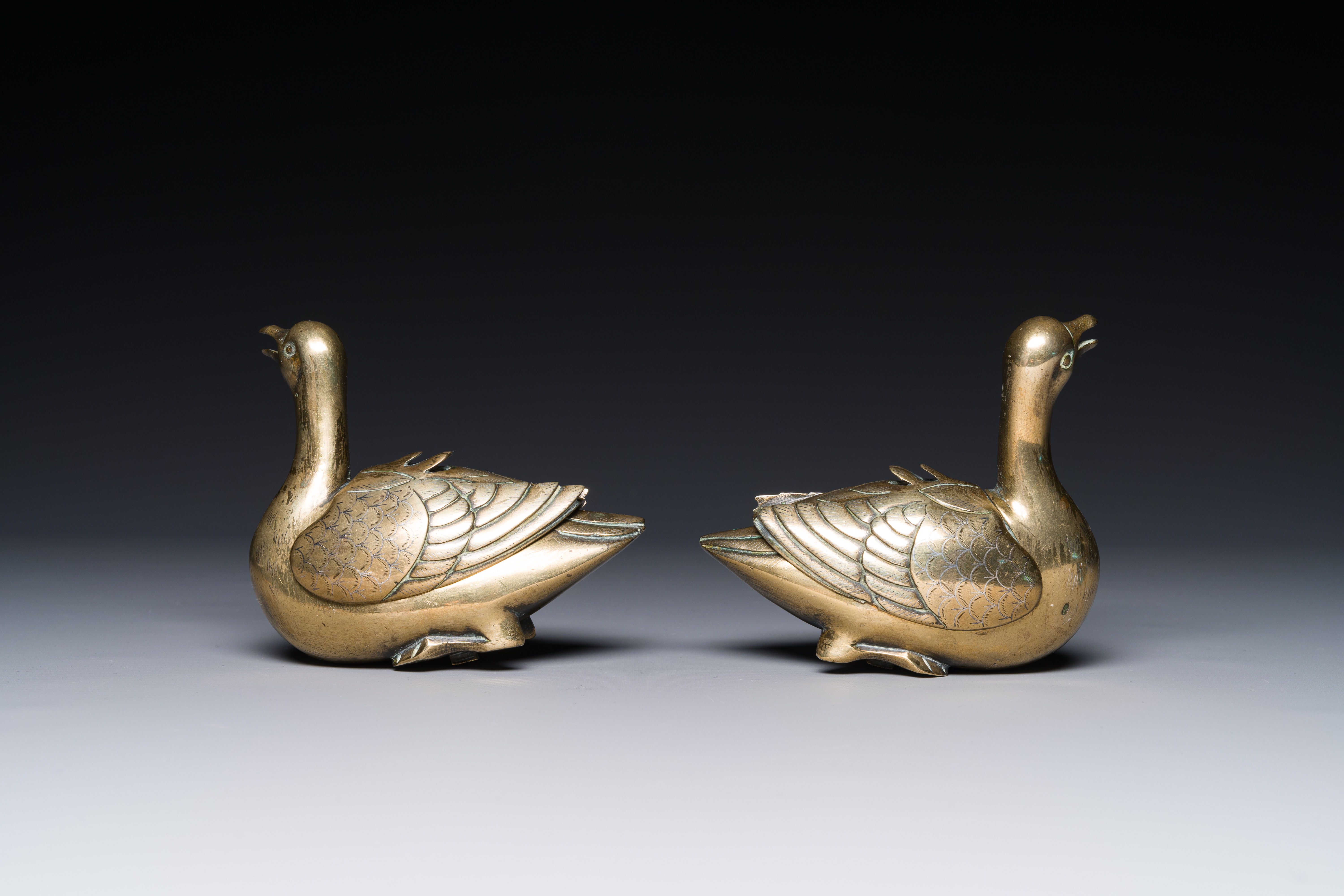 A pair of Chinese silver-inlaid bronze duck-form water droppers, Qing - Image 3 of 4