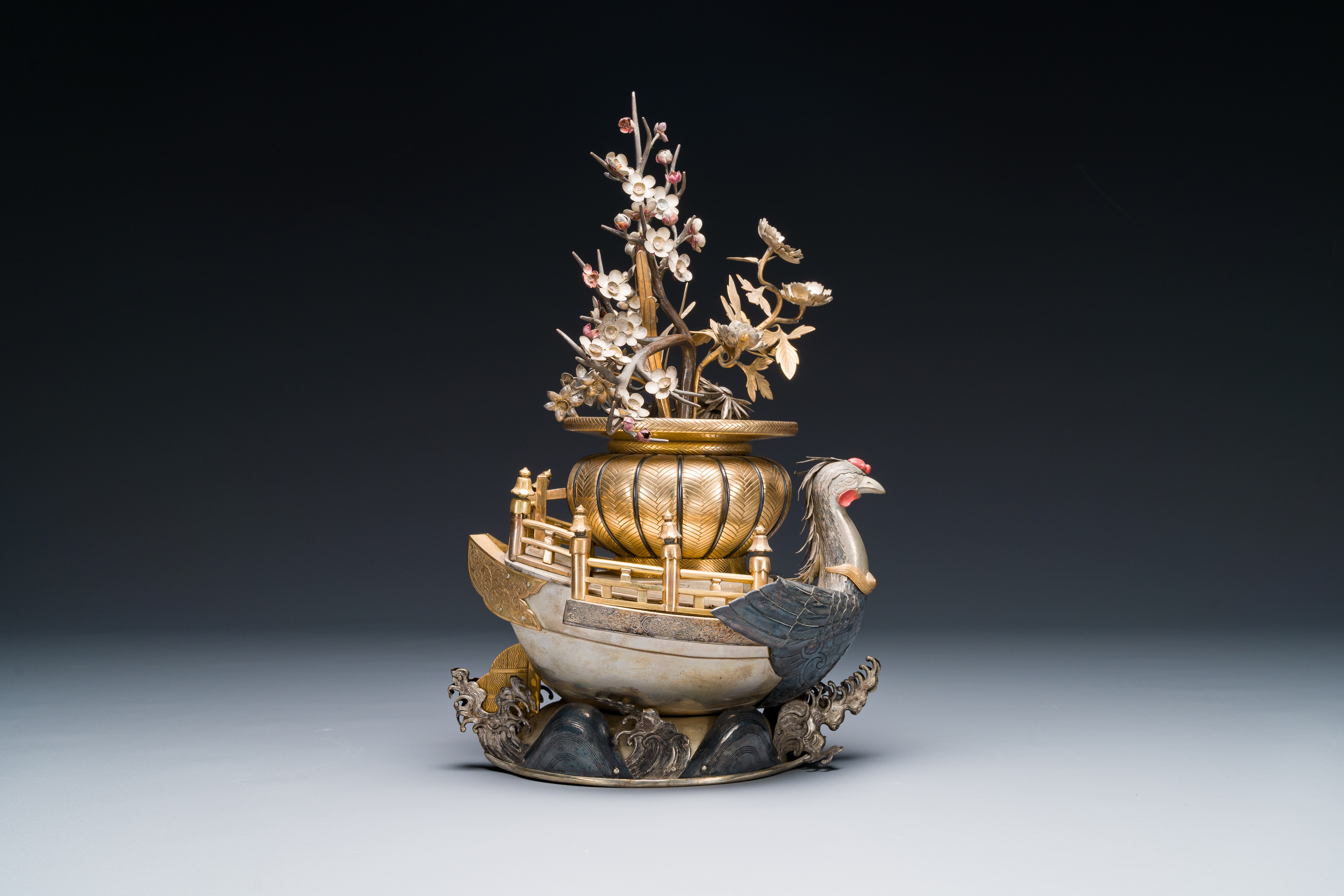 A Japanese parcel-gilt bronze and silver 'phoenix' boat, Meiji, 19th C. - Image 2 of 4