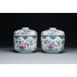 A pair of large Chinese famille rose jars and covers with floral design, Qianlong