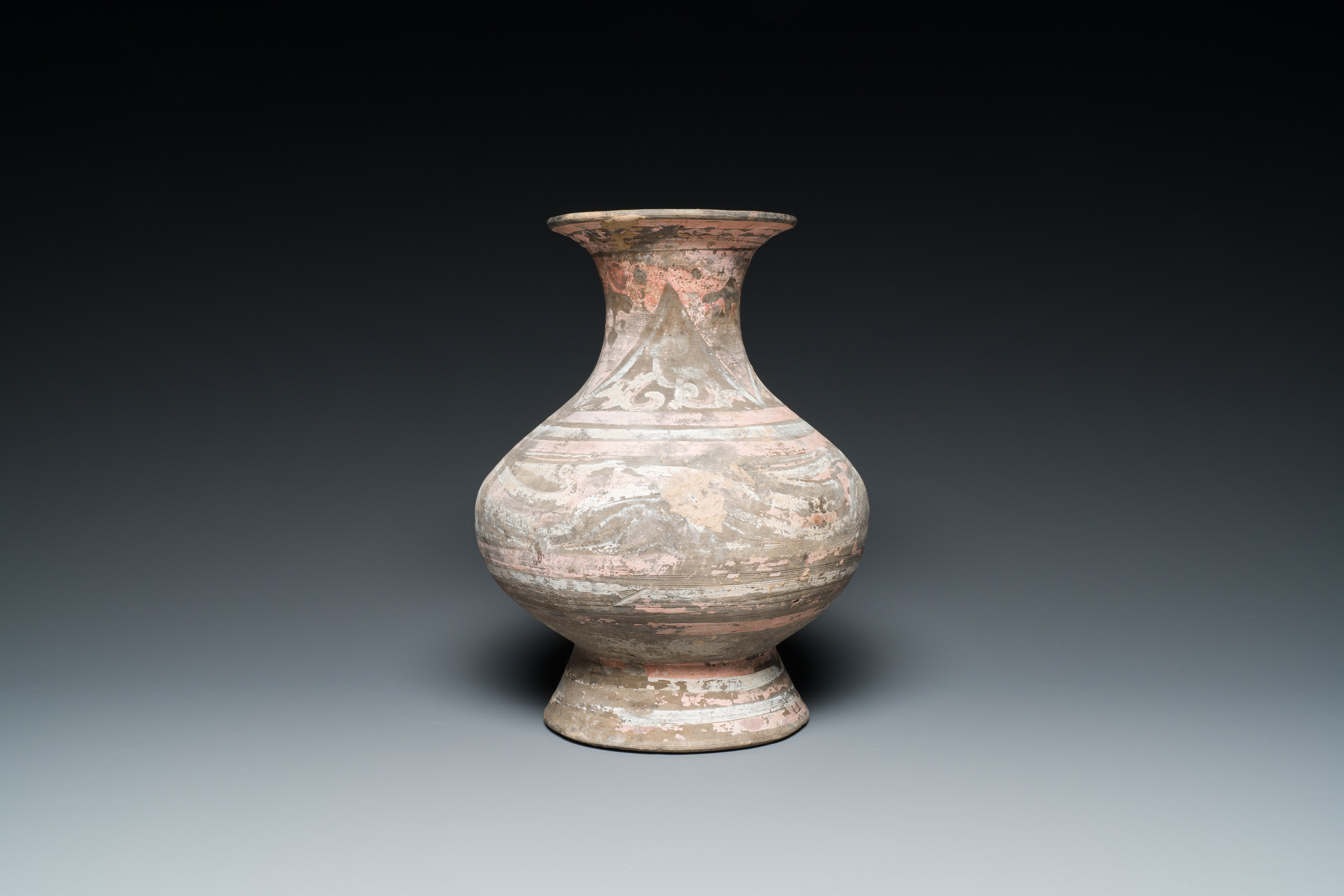 A Chinese polychrome painted pottery vase, Han