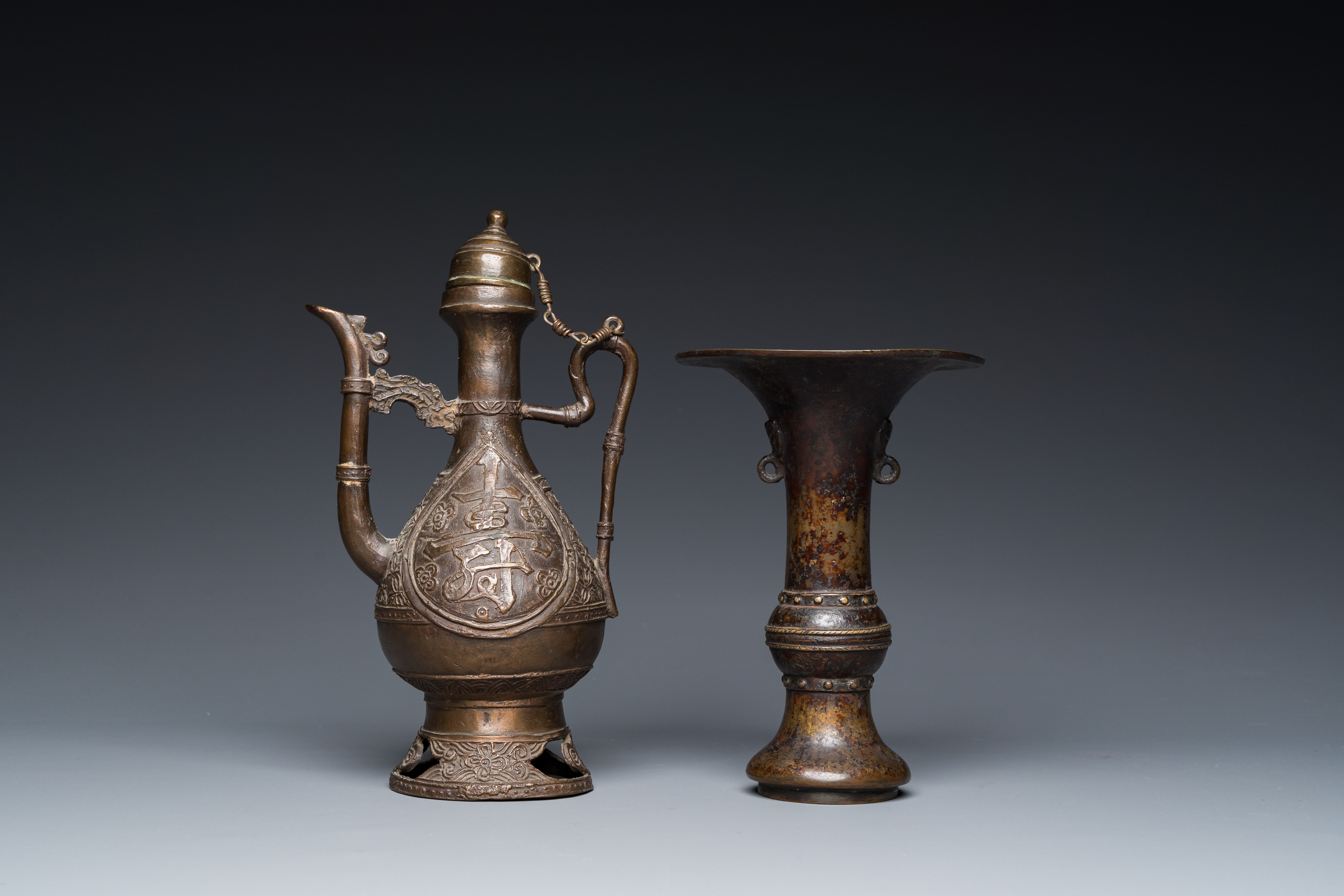 A Chinese bronze 'gu' vase and a bronze ewer and cover for the Islamic market, Ming - Image 11 of 24