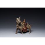 A rare Chinese partly lacquered and gilt bronze incense holder in the shape of a horse, Yuan/early M