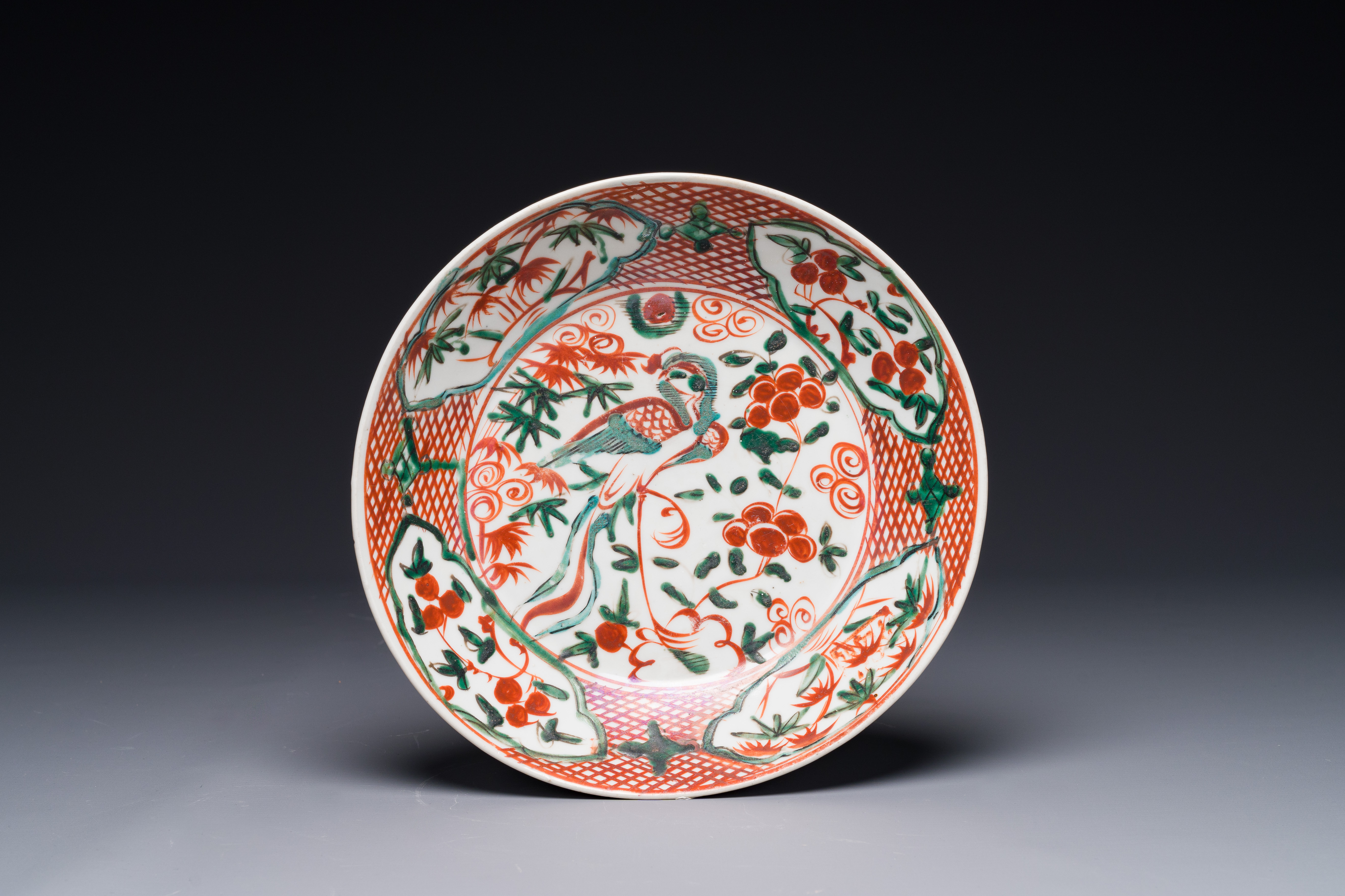 A Chinese Swatow wucai 'phoenix' plate, Ming