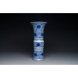 A Chinese blue and white 'chrysanthemum scroll' 'gu' vase, Kangxi