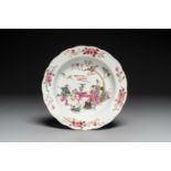 A Chinese famille rose plate with figures in a garden, Yongzheng