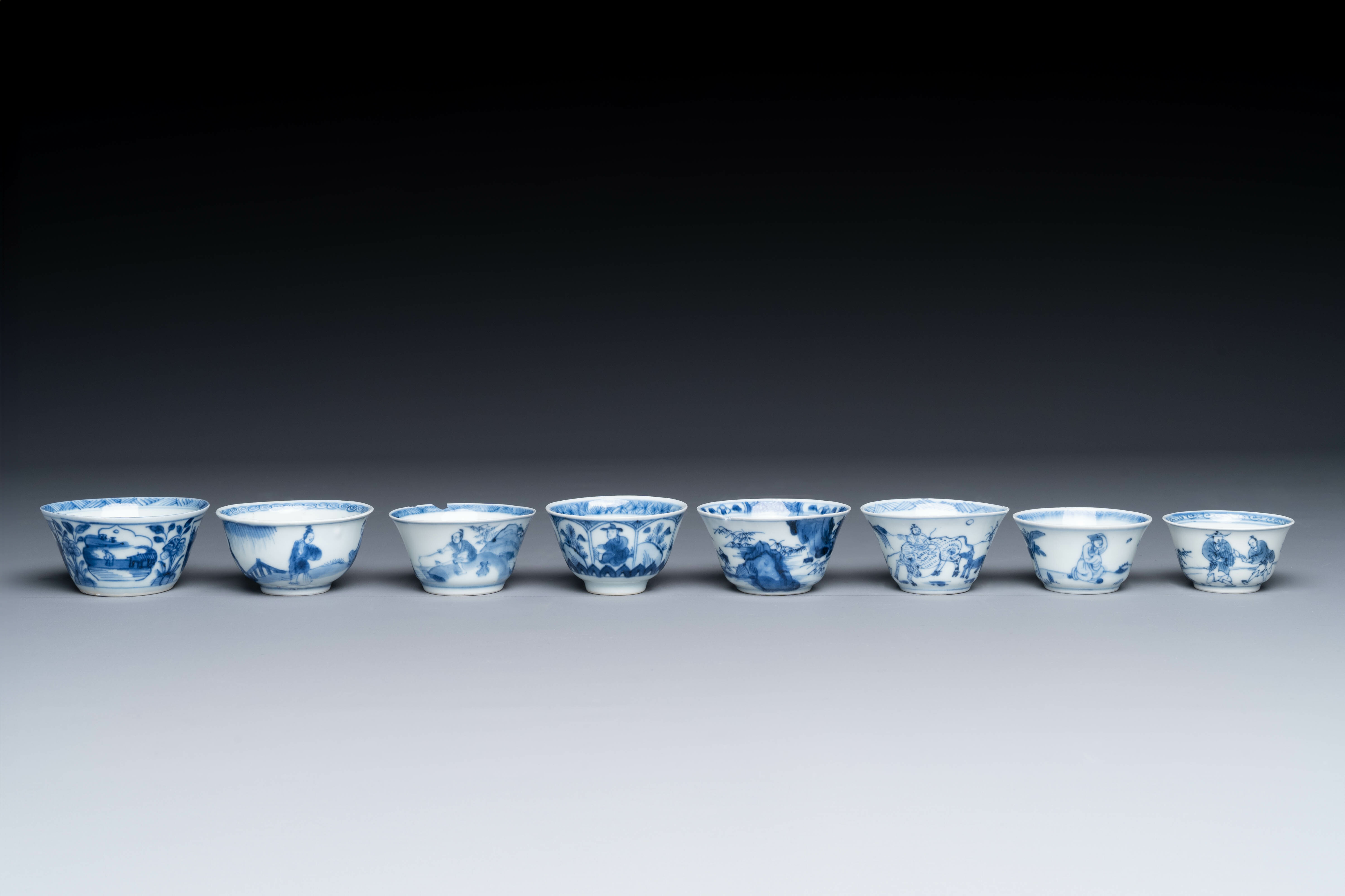 Thirteen Chinese blue and white saucers and twelve cups with figural design, Kangxi/Yongzheng - Image 4 of 11