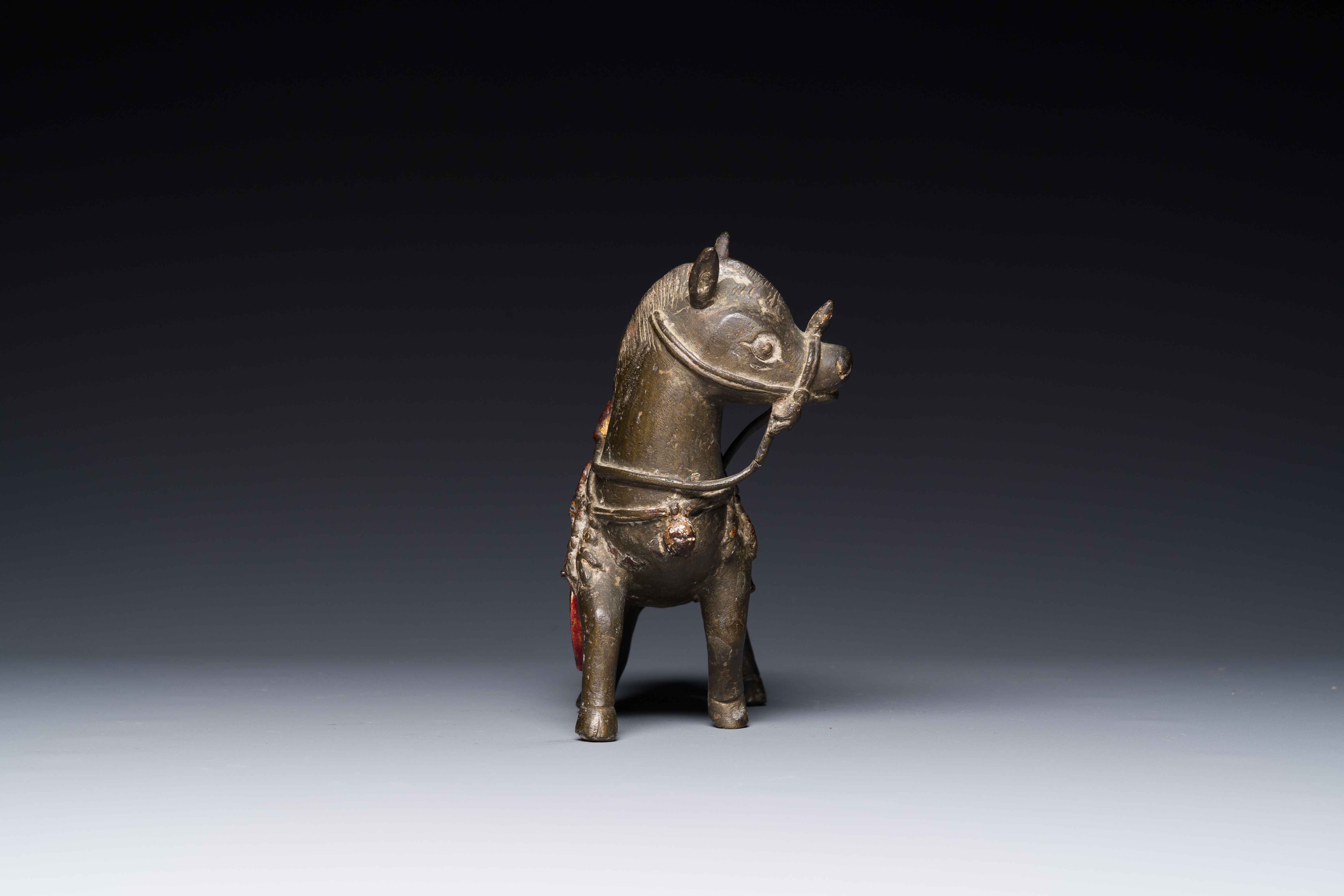 A rare Chinese partly lacquered and gilt bronze incense holder in the shape of a horse, Yuan/early M - Image 5 of 7