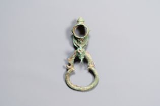 A bronze Khmer Bayon-style hanging hook from a palanquin, Angkor period, 12/13th C.