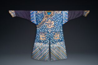 A Chinese gold thread embroidered blue-ground silk 'dragon' robe, 19th C.