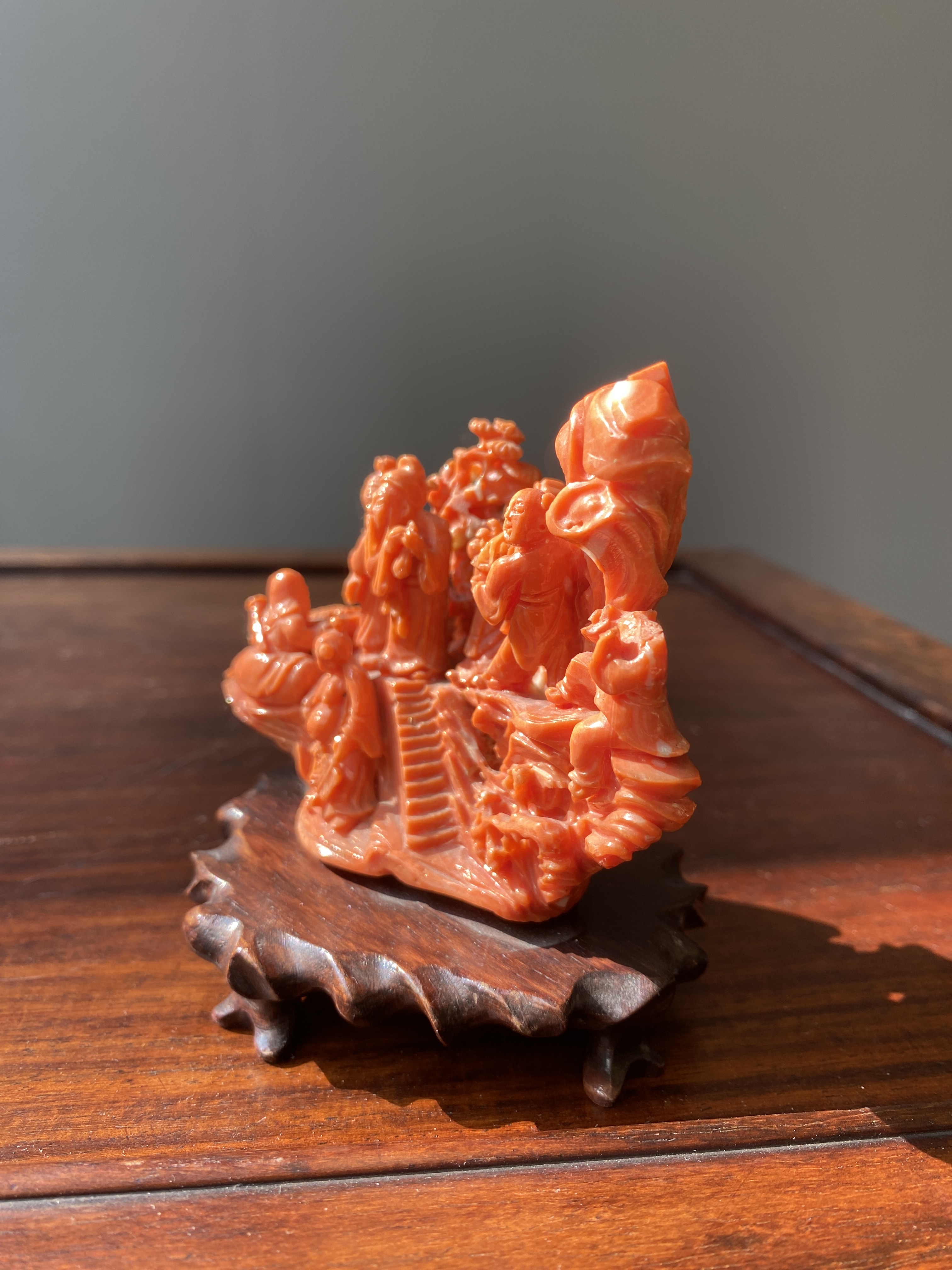 A Chinese red coral 'Eight Immortals' group on wooden stand, 19/20th C. - Image 8 of 14