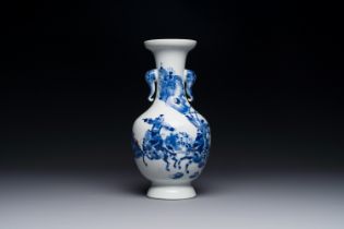 A Chinese blue, white and copper-red vase with warriors on horseback, Qianlong mark, 19th C.