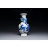 A Chinese blue, white and copper-red vase with warriors on horseback, Qianlong mark, 19th C.