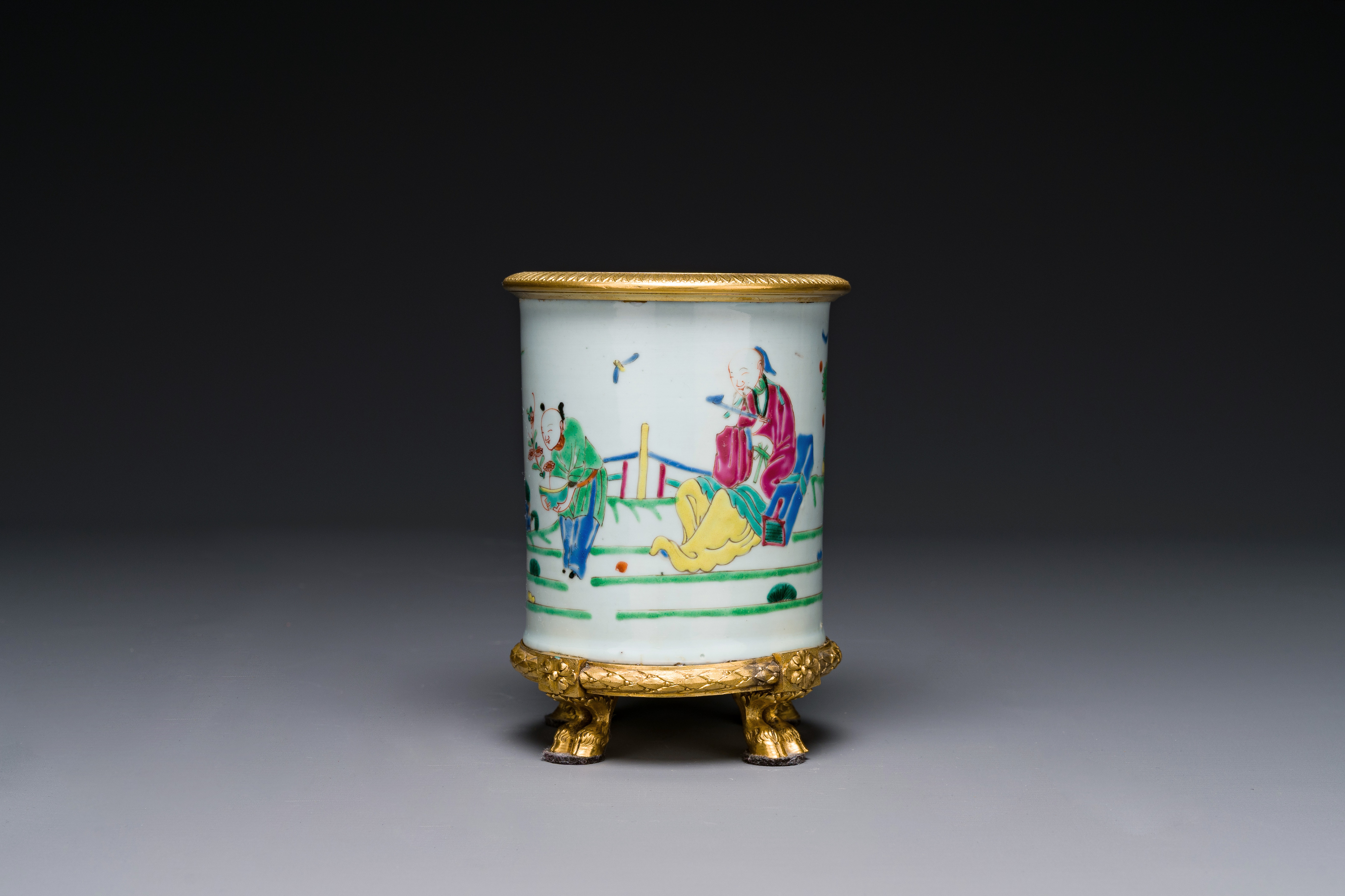 A Chinese famille rose 'Tao Yuanming é™¶æ·µæ˜Ž' brush pot with gilt bronze mounts, Yongzheng