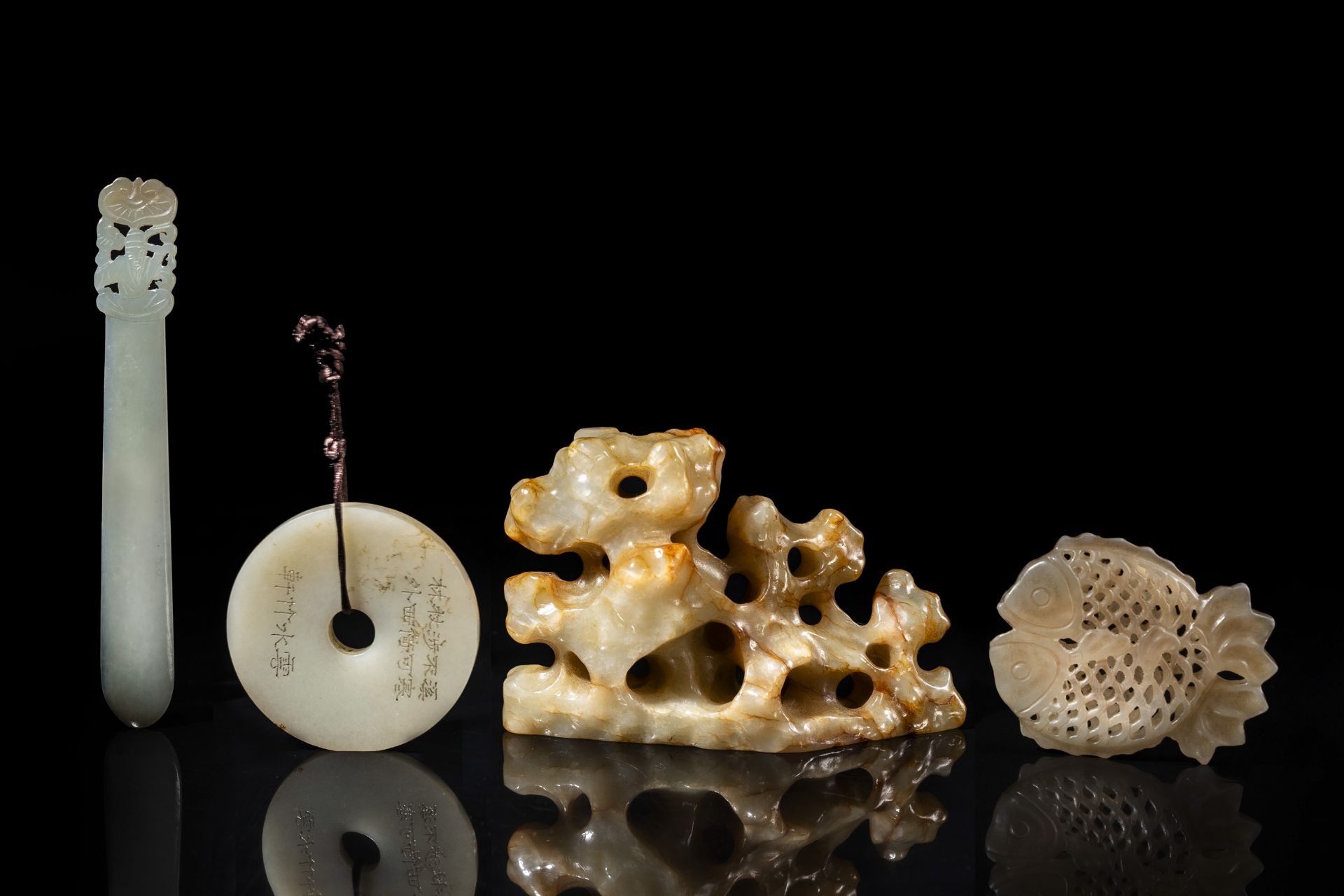 Four Chinese white, celadon and russet jade carvings, Qing - Image 6 of 7