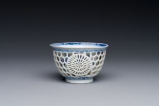 A rare Chinese reticulated double-walled blue and white cup, Kangxi