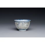 A rare Chinese reticulated double-walled blue and white cup, Kangxi