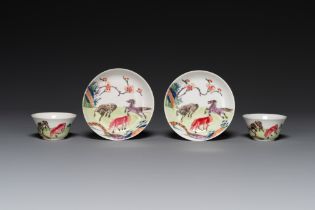 A pair of Chinese famille rose cups and saucers with horses, Yongzheng