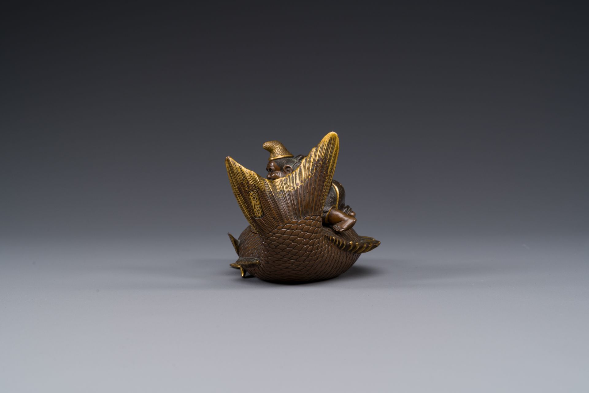 A Japanese partly gilded bronze lidded box in the shape of Ebisu on sea bream, signed Miyao Zo, Meij - Image 3 of 10