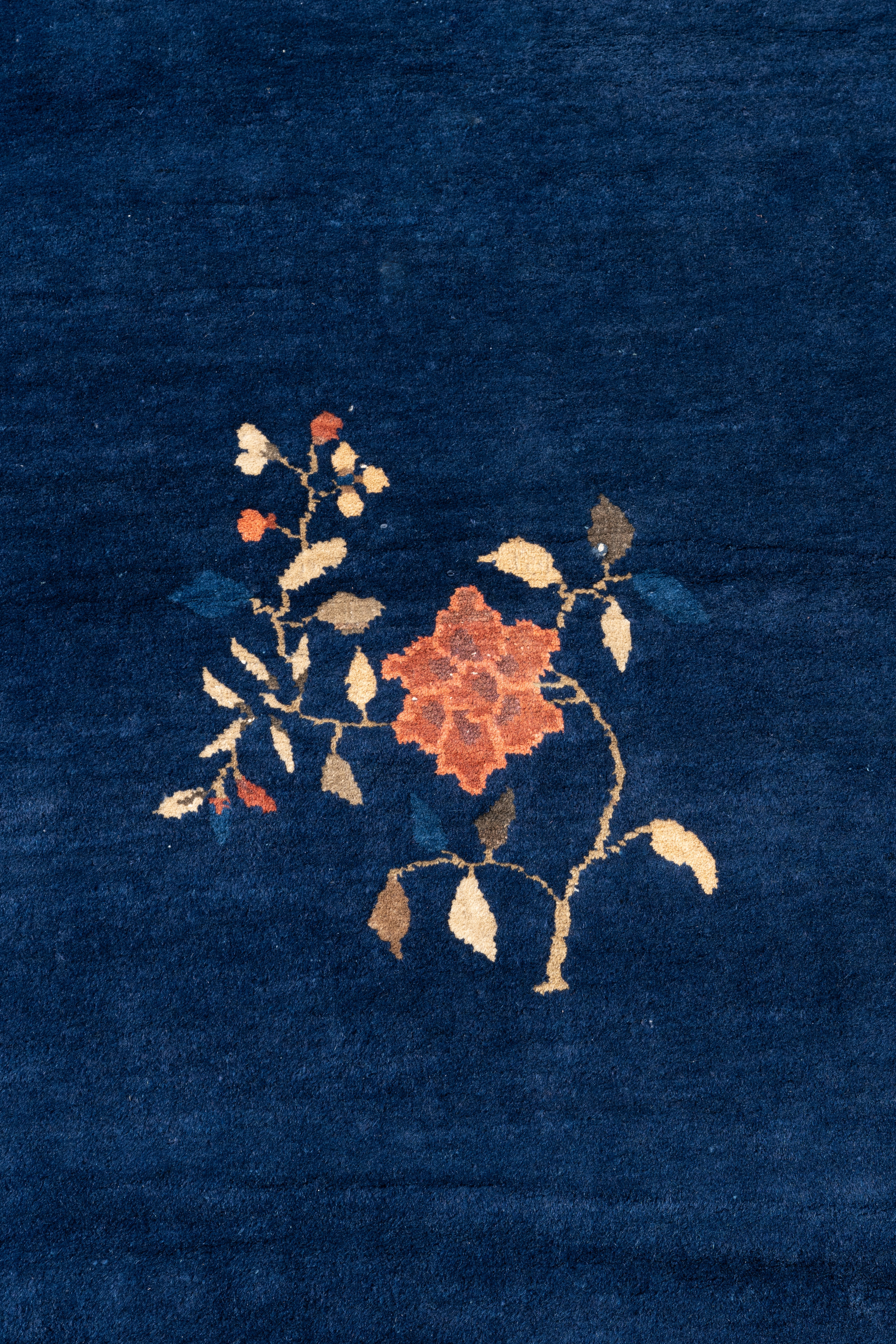 A large Chinese dark-blue-ground carpet with floral design, 19/20th century - Image 5 of 7