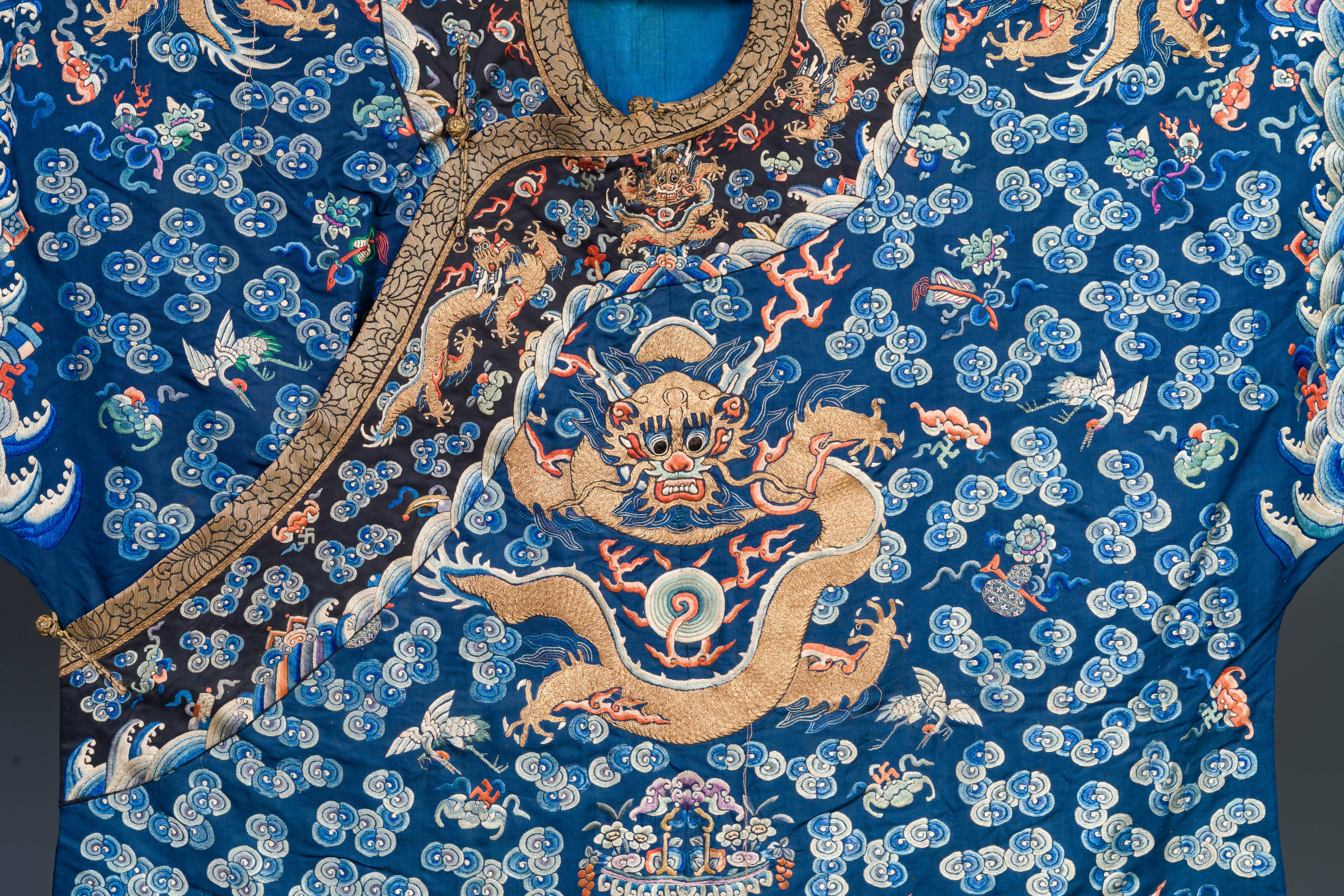 A Chinese gold thread embroidered blue-ground silk 'dragon' robe, 19th C. - Image 3 of 7