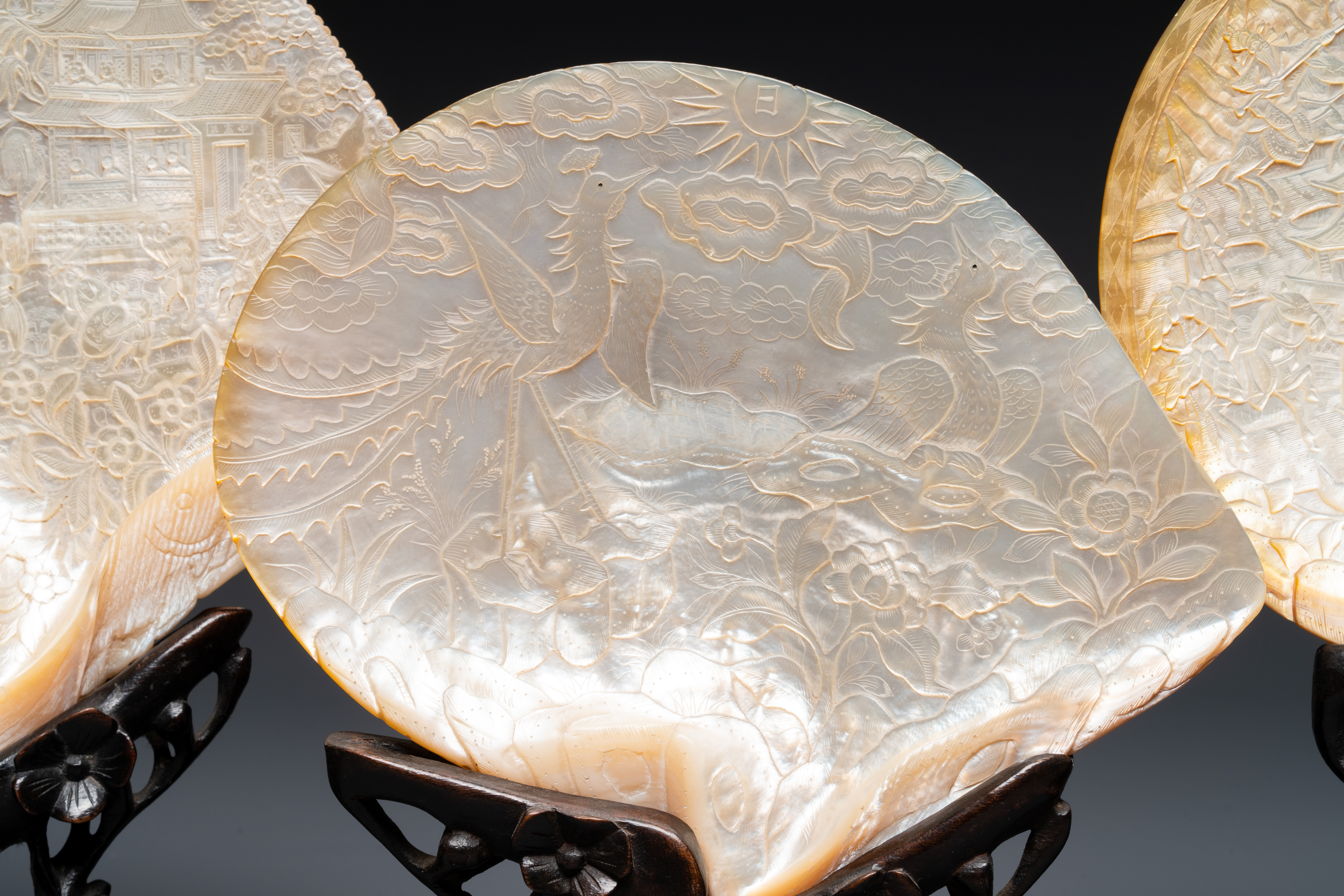 Five Chinese carved mother-of-pearl shells on wooden stands, Canton, 19th C. - Image 2 of 7