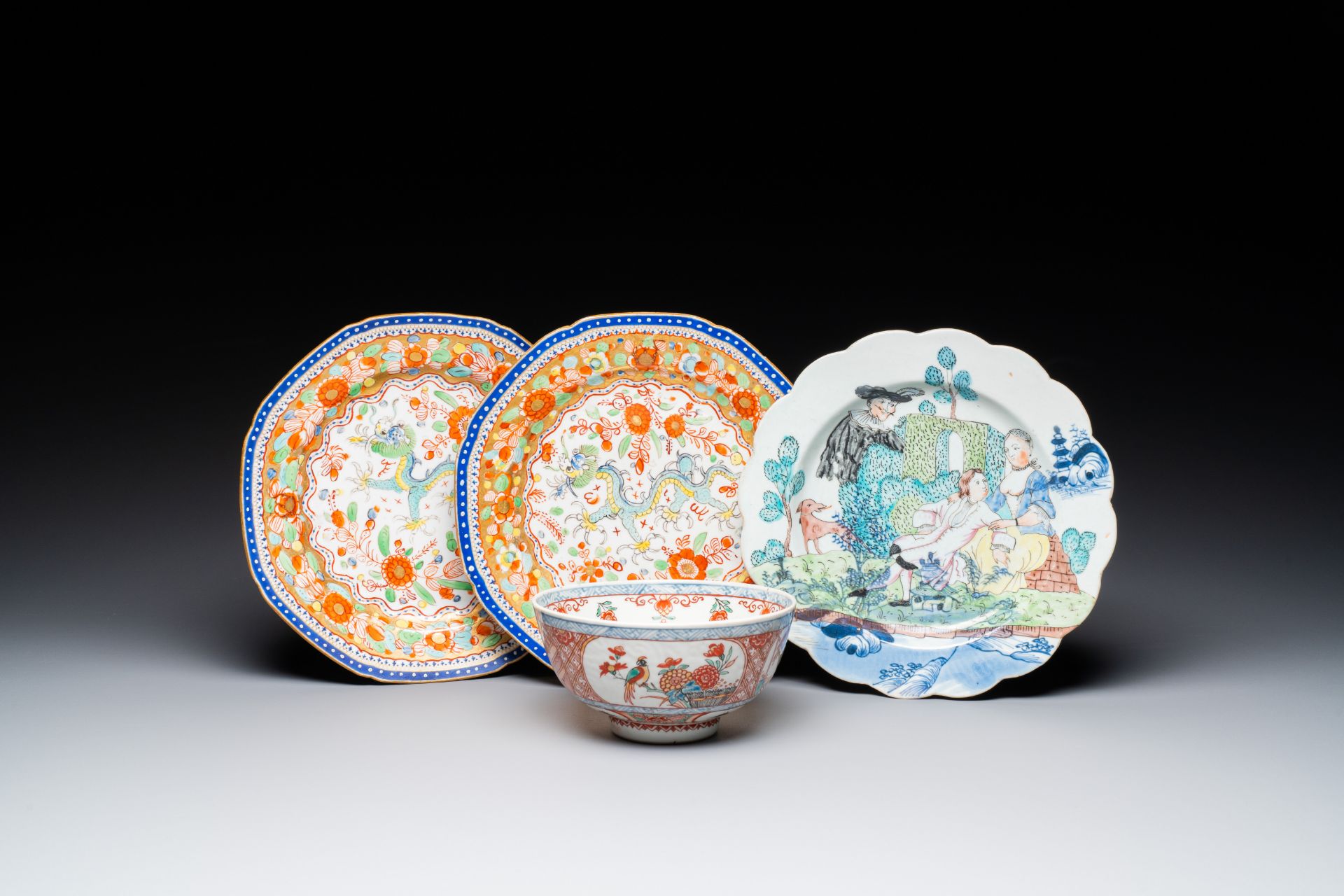 A pair of Chinese English-decorated plates and a Dutch-overdecorated Chinese bowl and plate, Qianlon