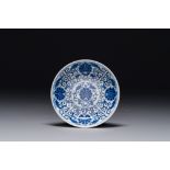 A Chinese blue and white 'lotus scroll' plate, Guangxu mark and of the period