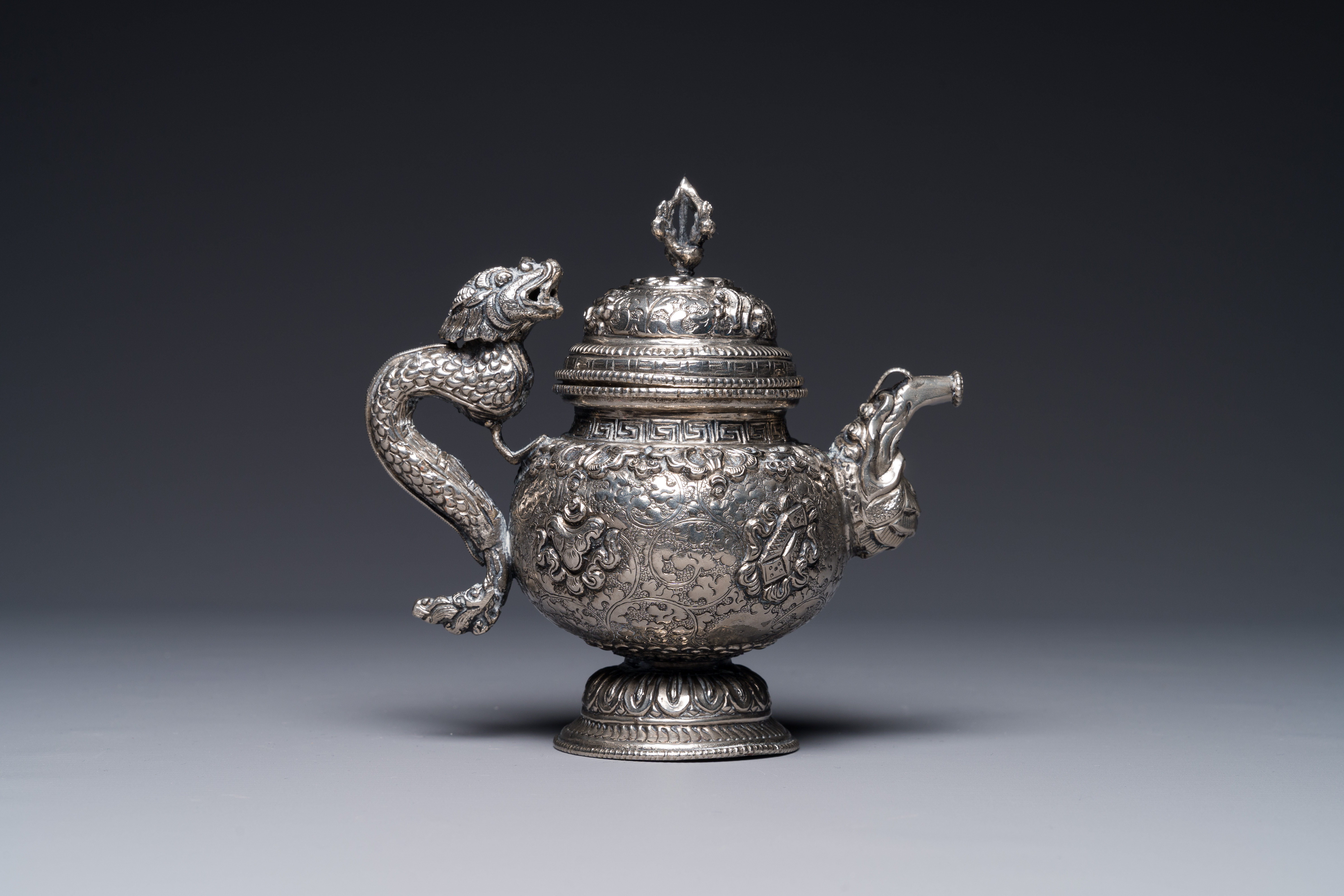 A fine Tibetan silver plated 'bajixiang' teapot, 19th C. - Image 3 of 4